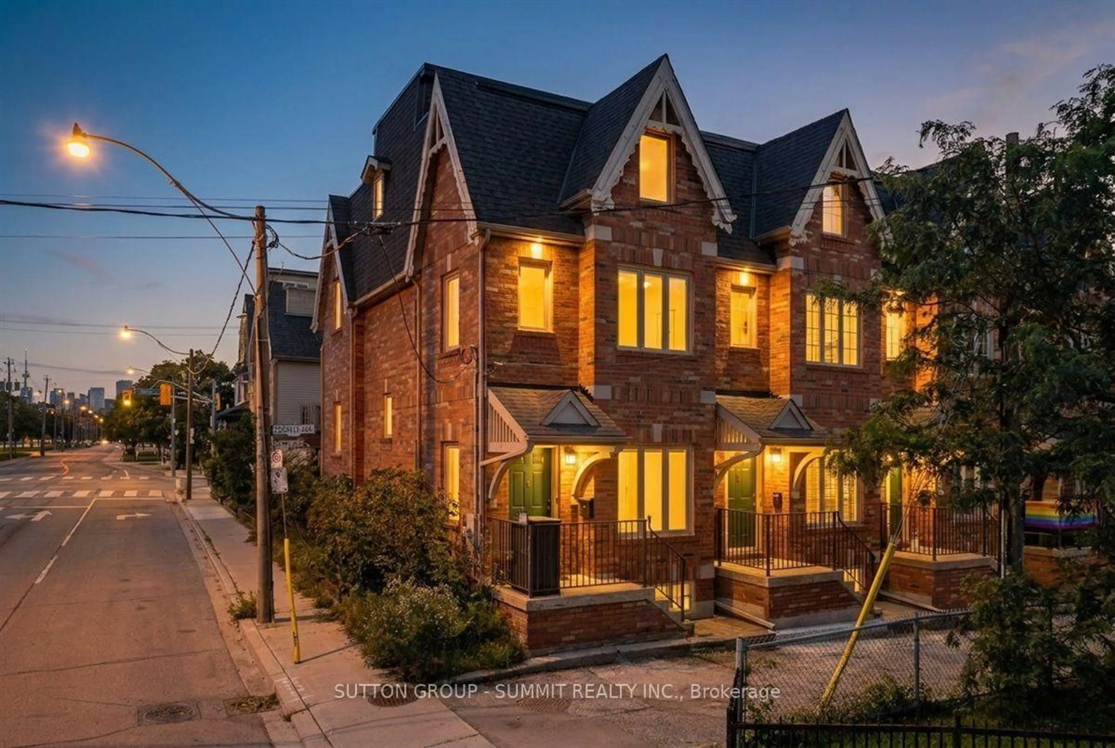 Home with brick exterior material, street for 2 Cam Fella Lane, Toronto Ontario M4L 3Z5