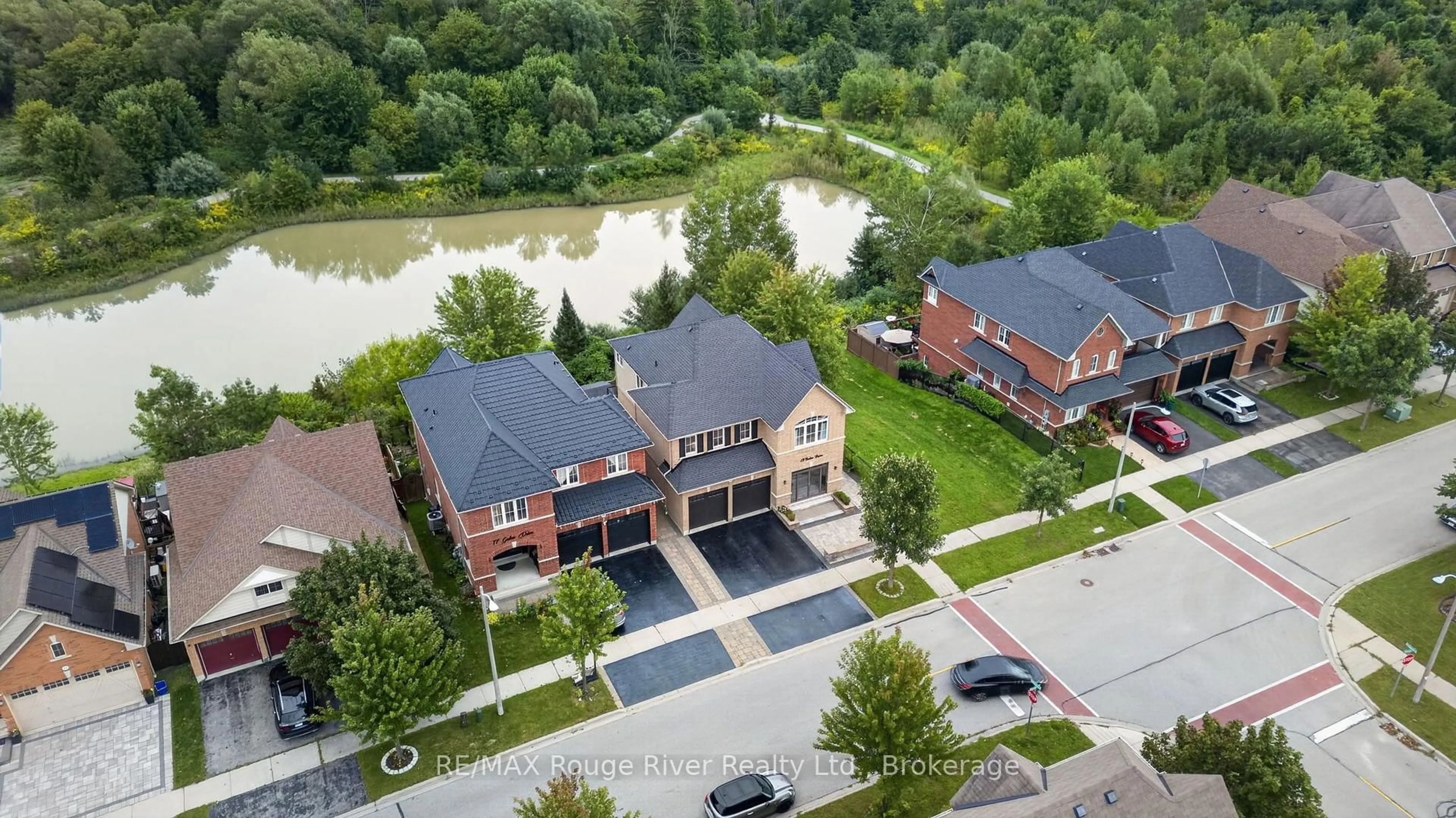 A pic from outside/outdoor area/front of a property/back of a property/a pic from drone, water/lake/river/ocean view for 19 Galea Dr, Ajax Ontario L1Z 0J7