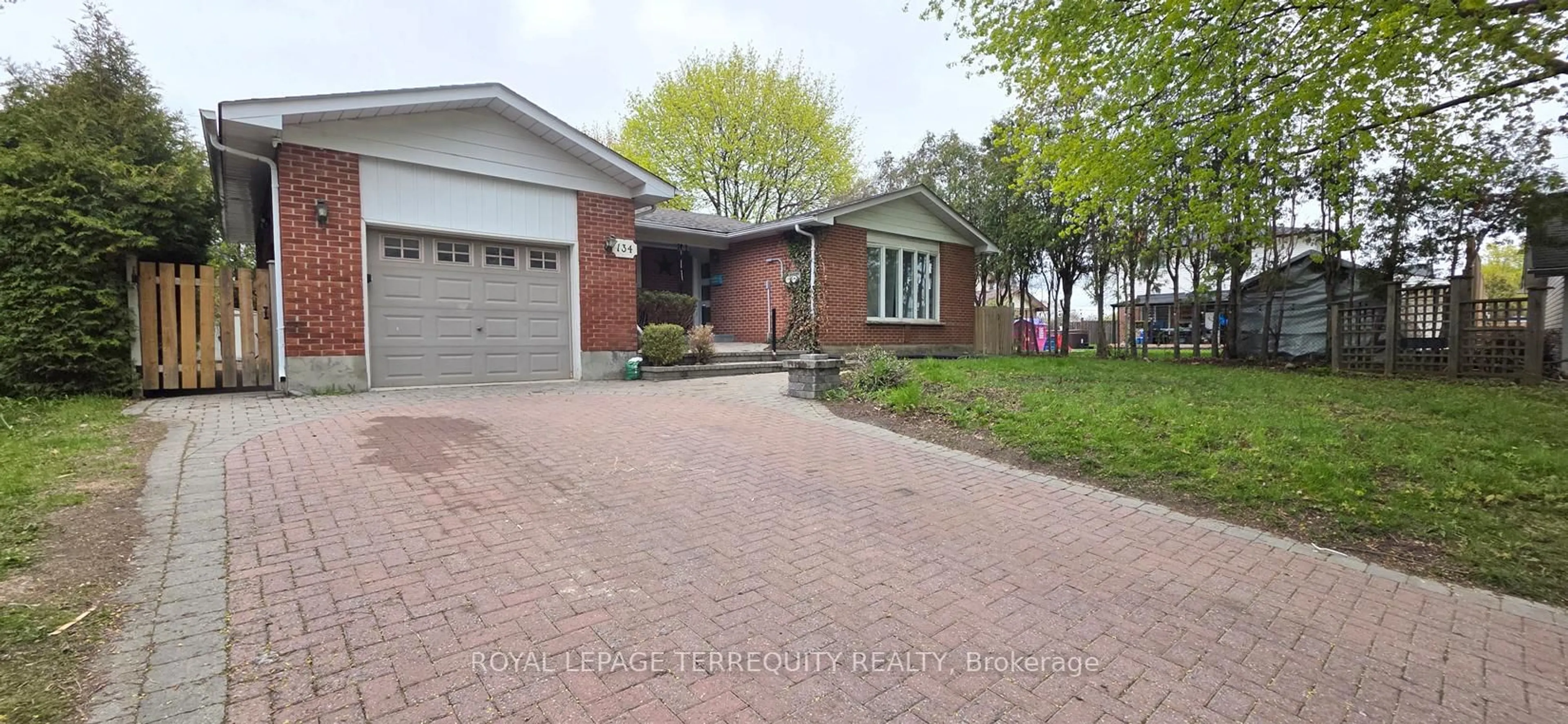 Home with brick exterior material, street for 134 Switzer Dr, Oshawa Ontario L1G 3J7