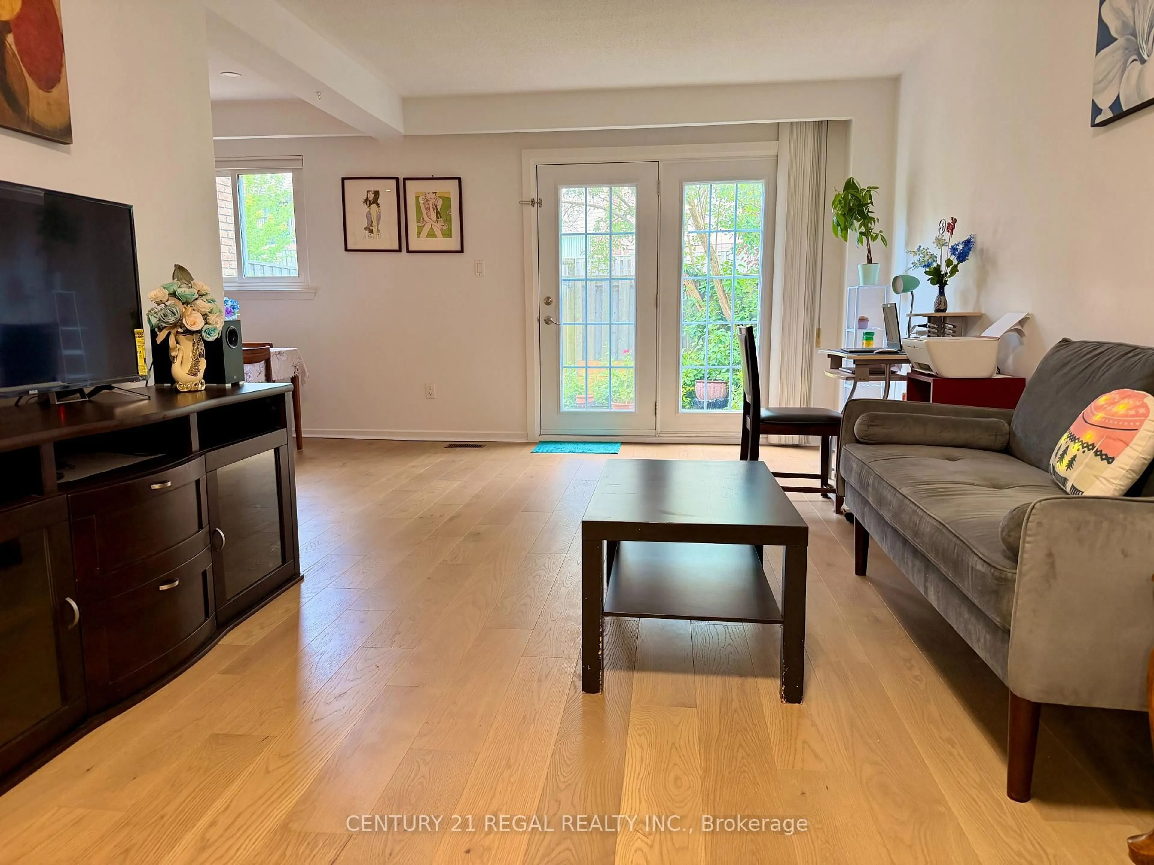Living room with furniture, wood/laminate floor for 8 Chamberlain Crt, Ajax Ontario L1S 3M7
