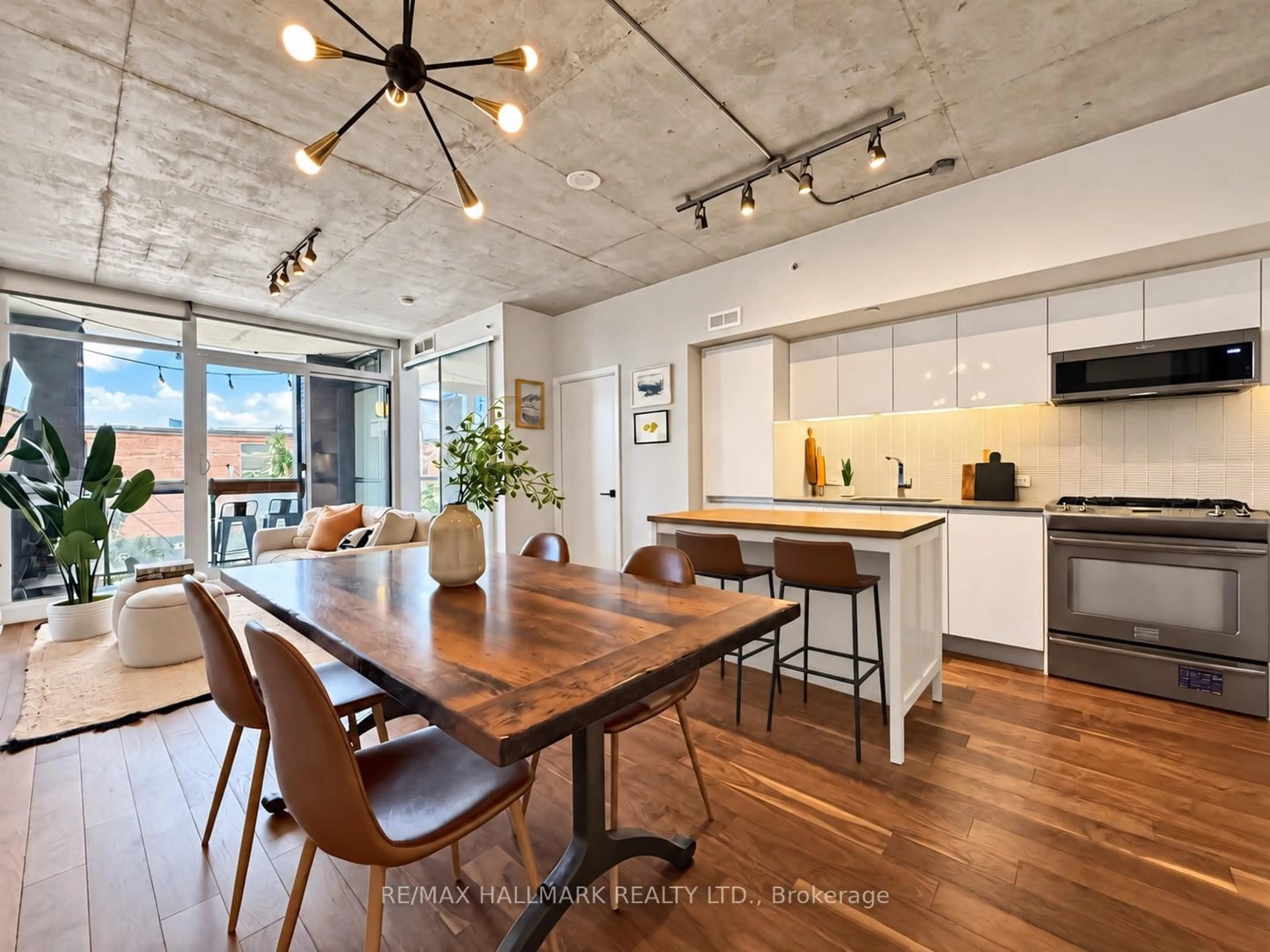 Open concept kitchen, cement floor for 1190 Dundas St #219, Toronto Ontario M4M 0C5