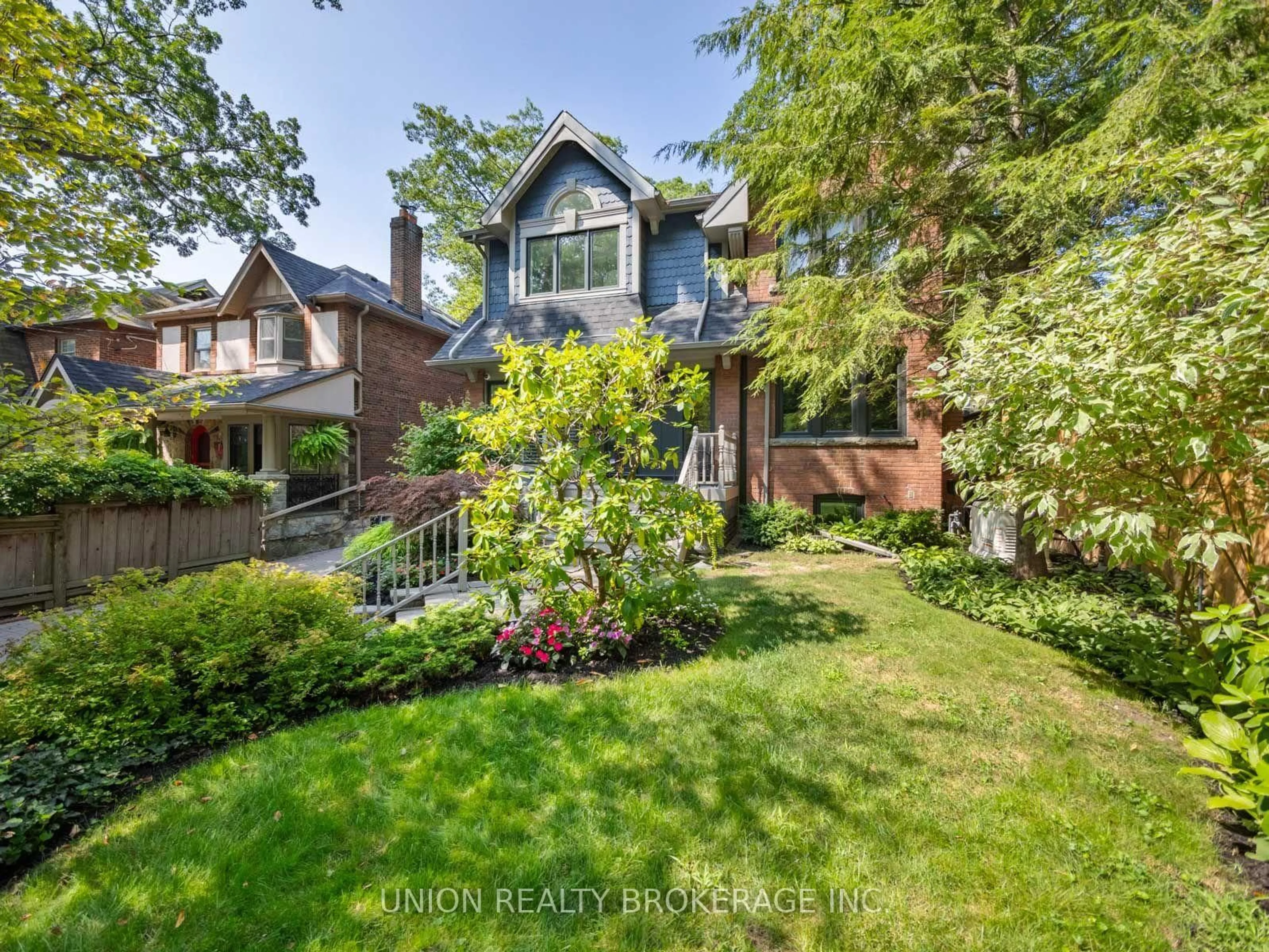 Home with brick exterior material, street for 66 Silver Birch Ave, Toronto Ontario M4E 3K9