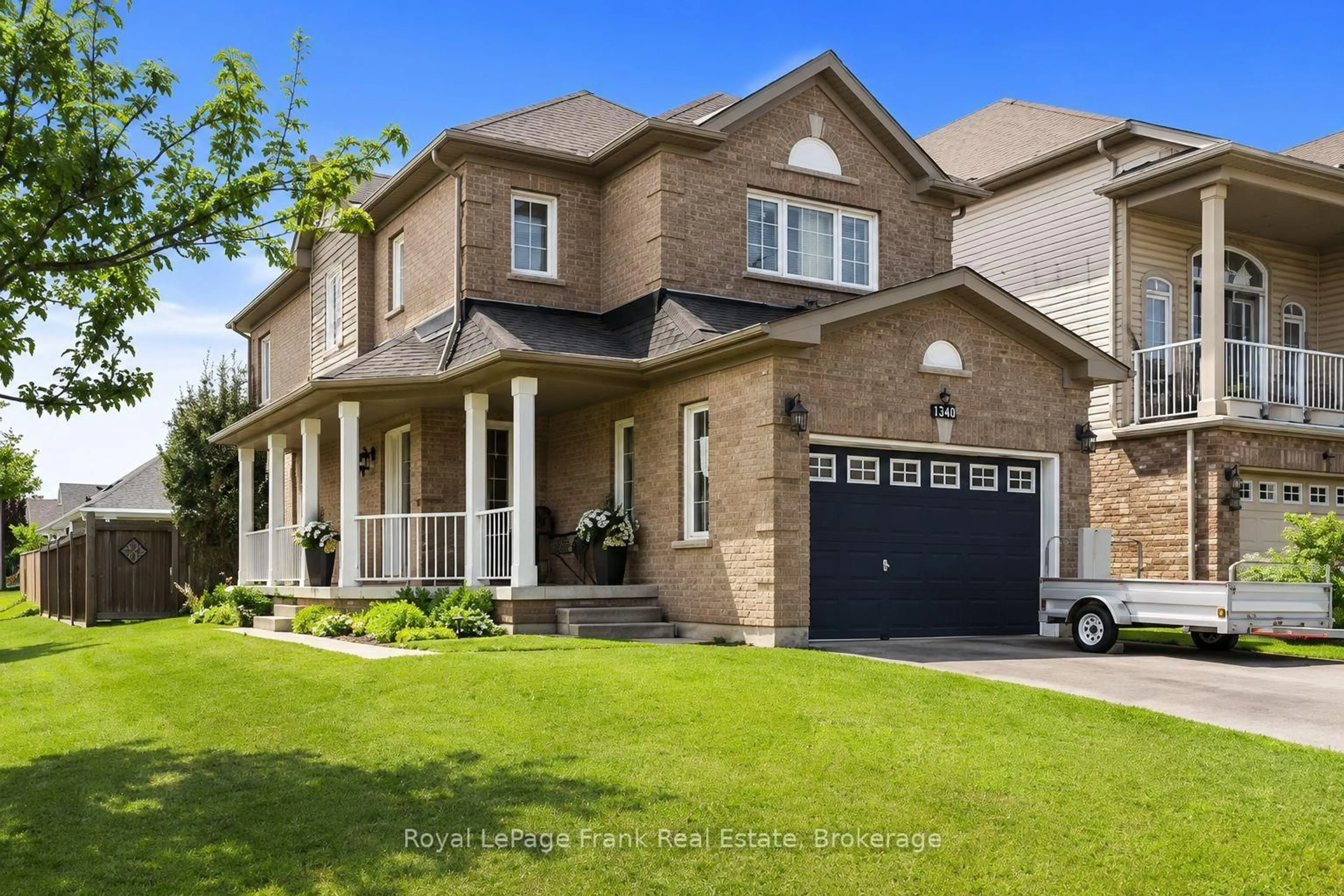 Home with brick exterior material, street for 1340 Wadebridge Cres, Oshawa Ontario L1K 3B2