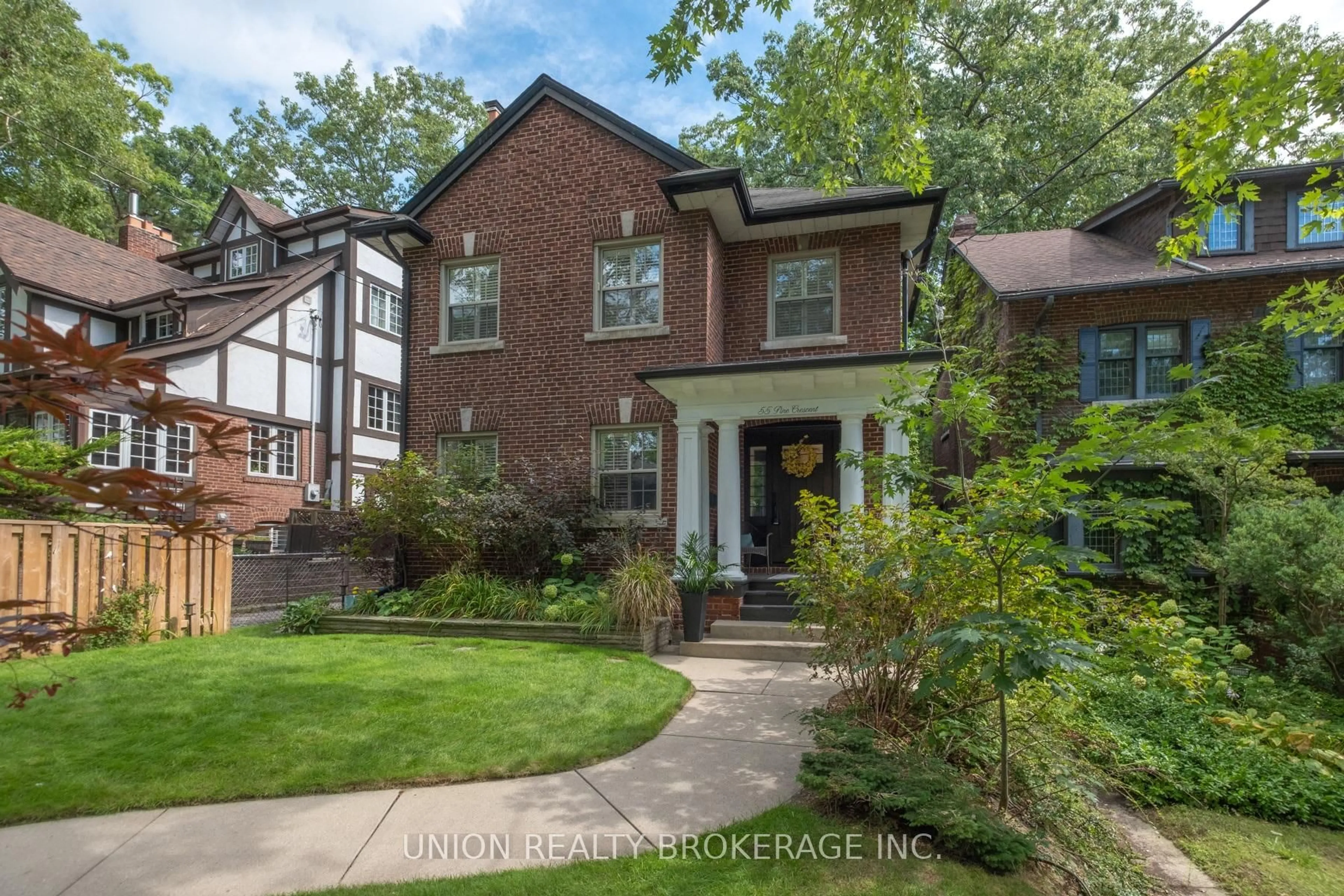 Home with brick exterior material, street for 55 Pine Cres, Toronto Ontario M4E 1L3