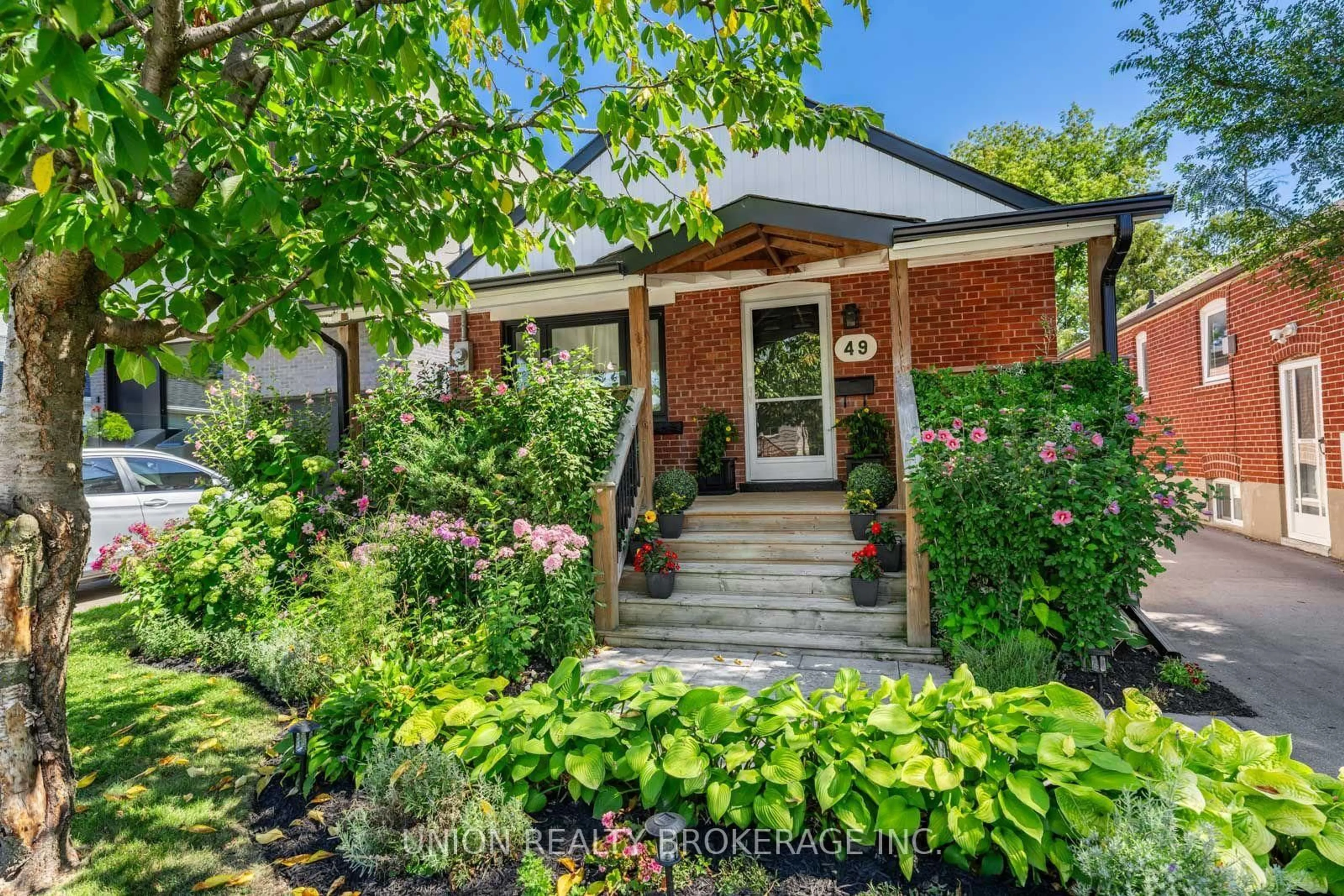 Home with brick exterior material, street for 49 Claremore Ave, Toronto Ontario M1N 3S1