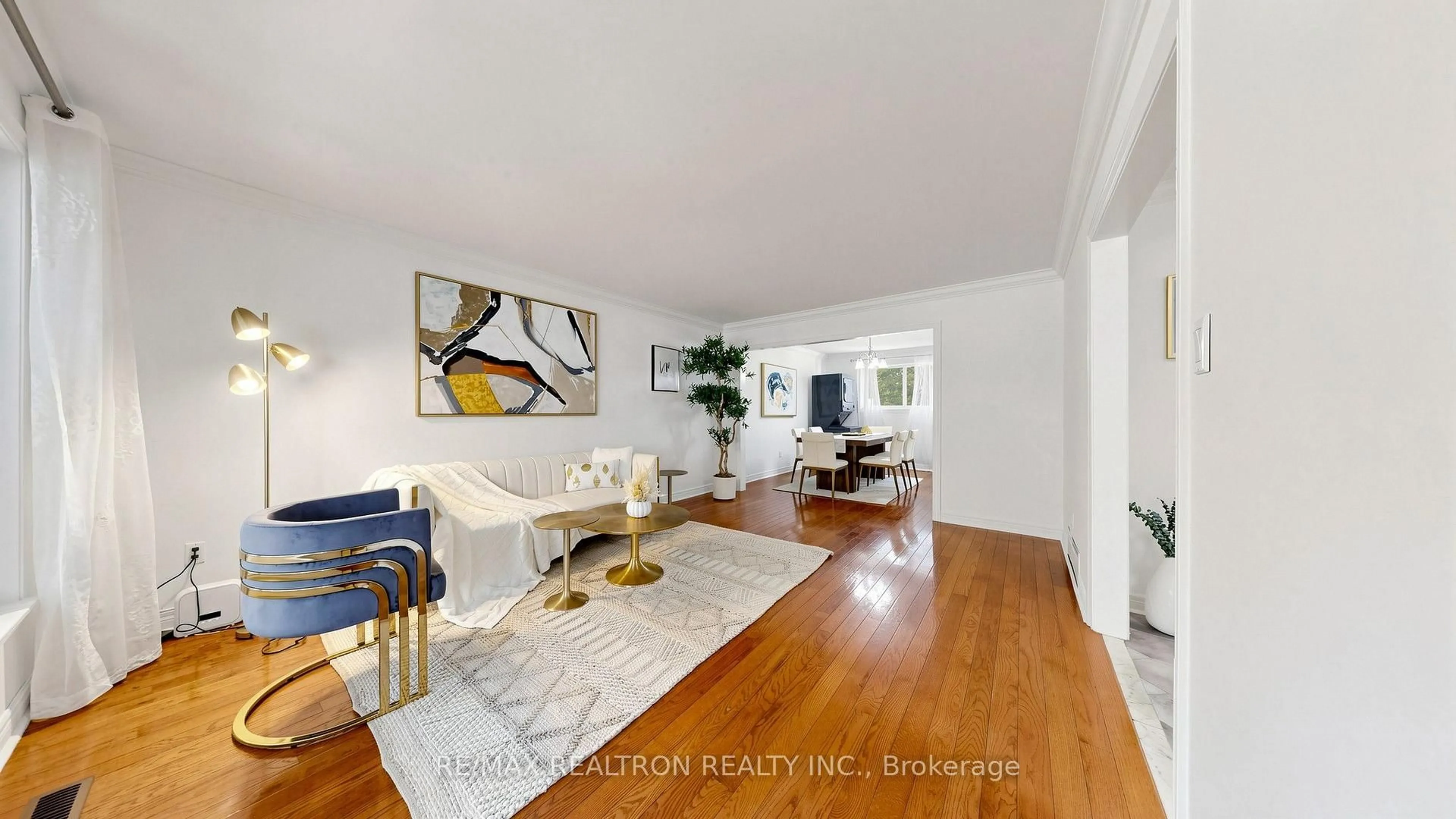 Living room with furniture, wood/laminate floor for 229 CHARTLAND Blvd, Toronto Ontario M1S 2S4