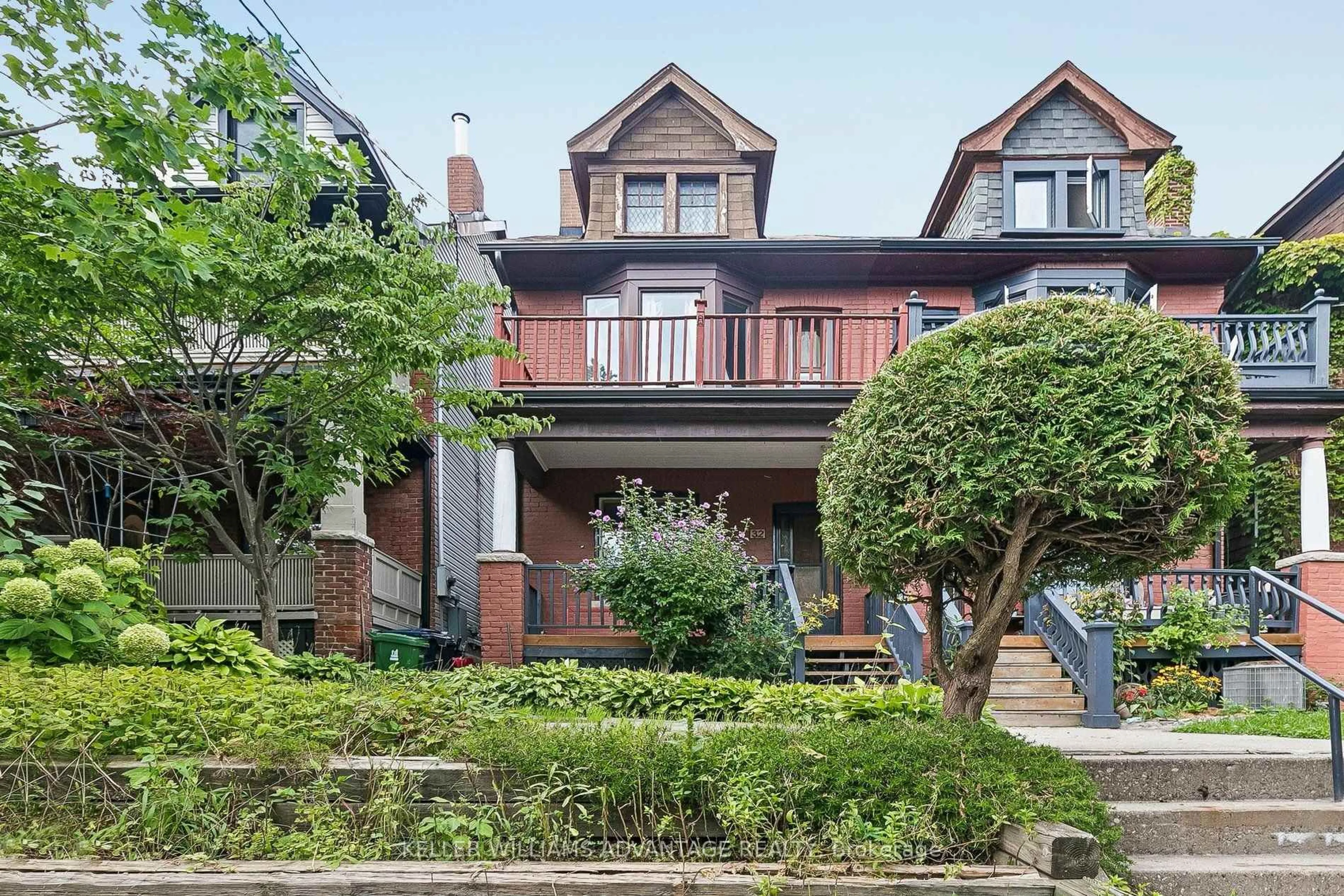 Home with brick exterior material, street for 32 Dingwall Ave, Toronto Ontario M4J 1C3