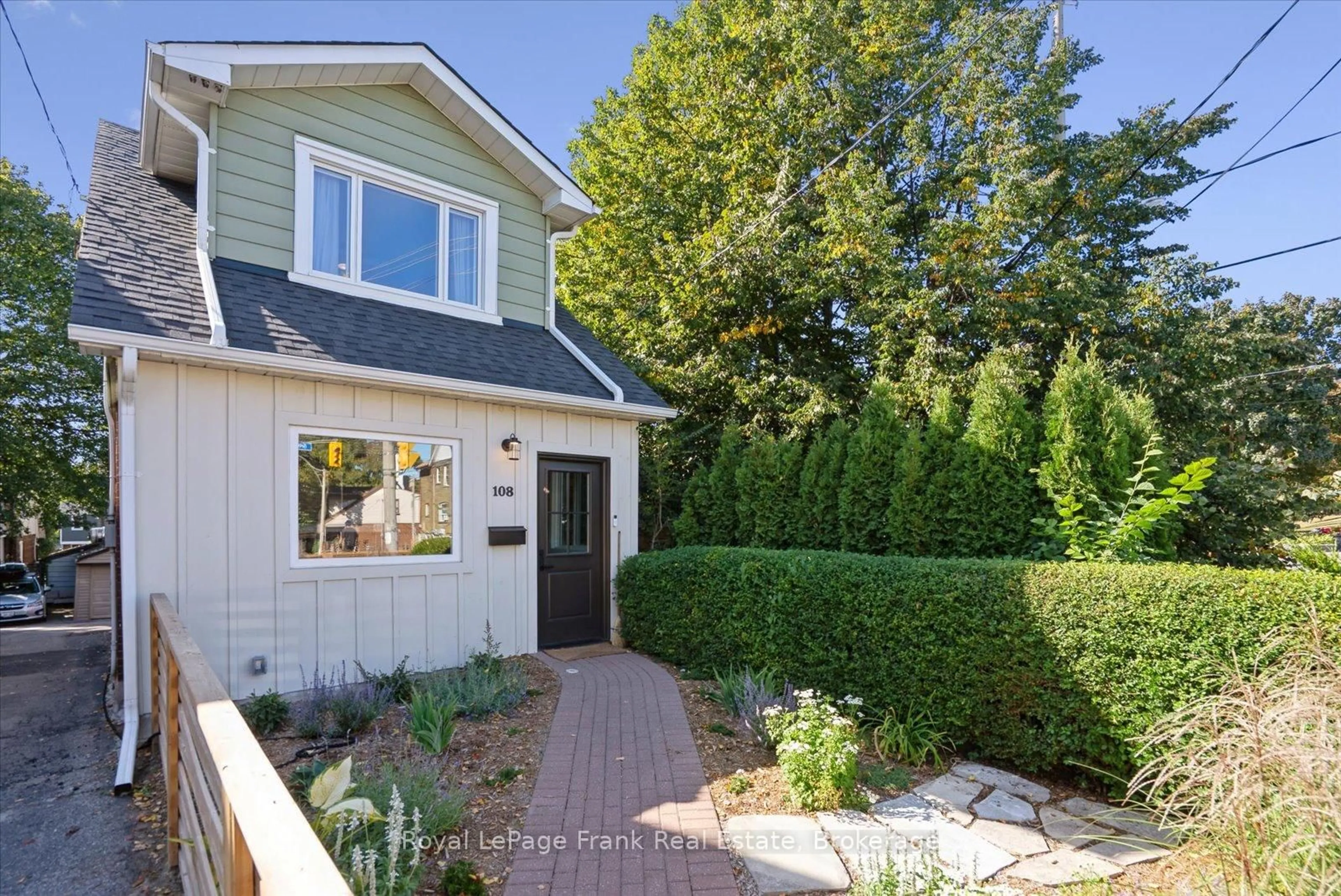 Home with vinyl exterior material, street for 108 Greenwood Ave, Toronto Ontario M4L 2P6
