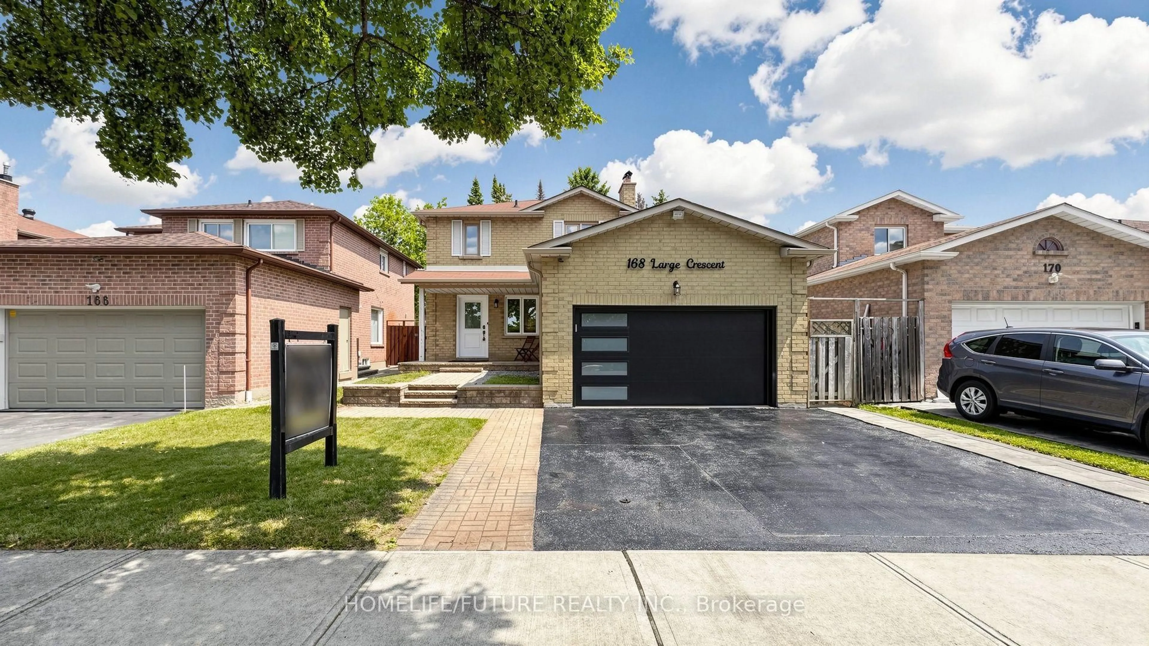 Home with brick exterior material, street for 168 Large Cres, Ajax Ontario L1T 2S4