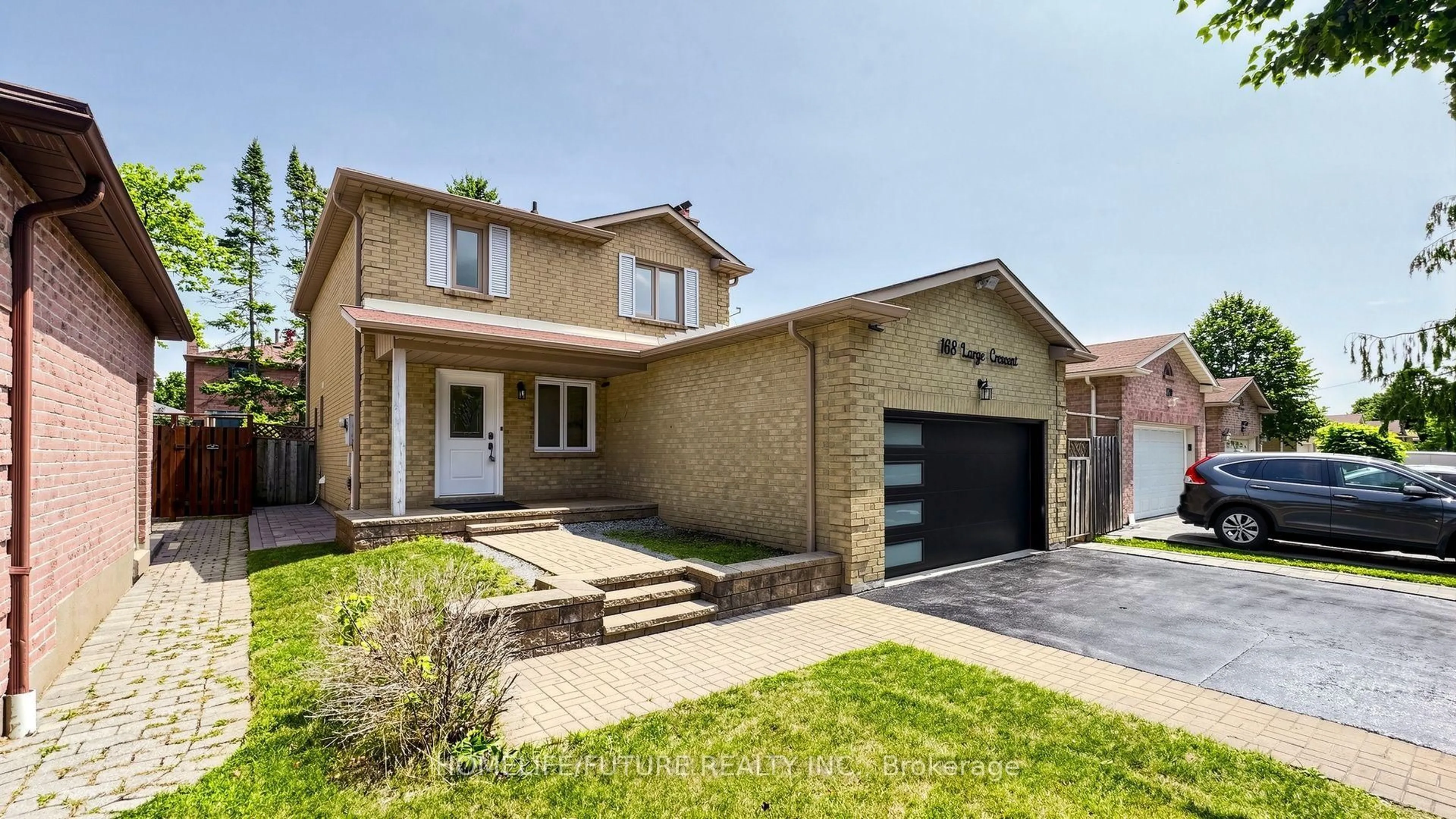 Home with brick exterior material, street for 168 Large Cres, Ajax Ontario L1T 2S4