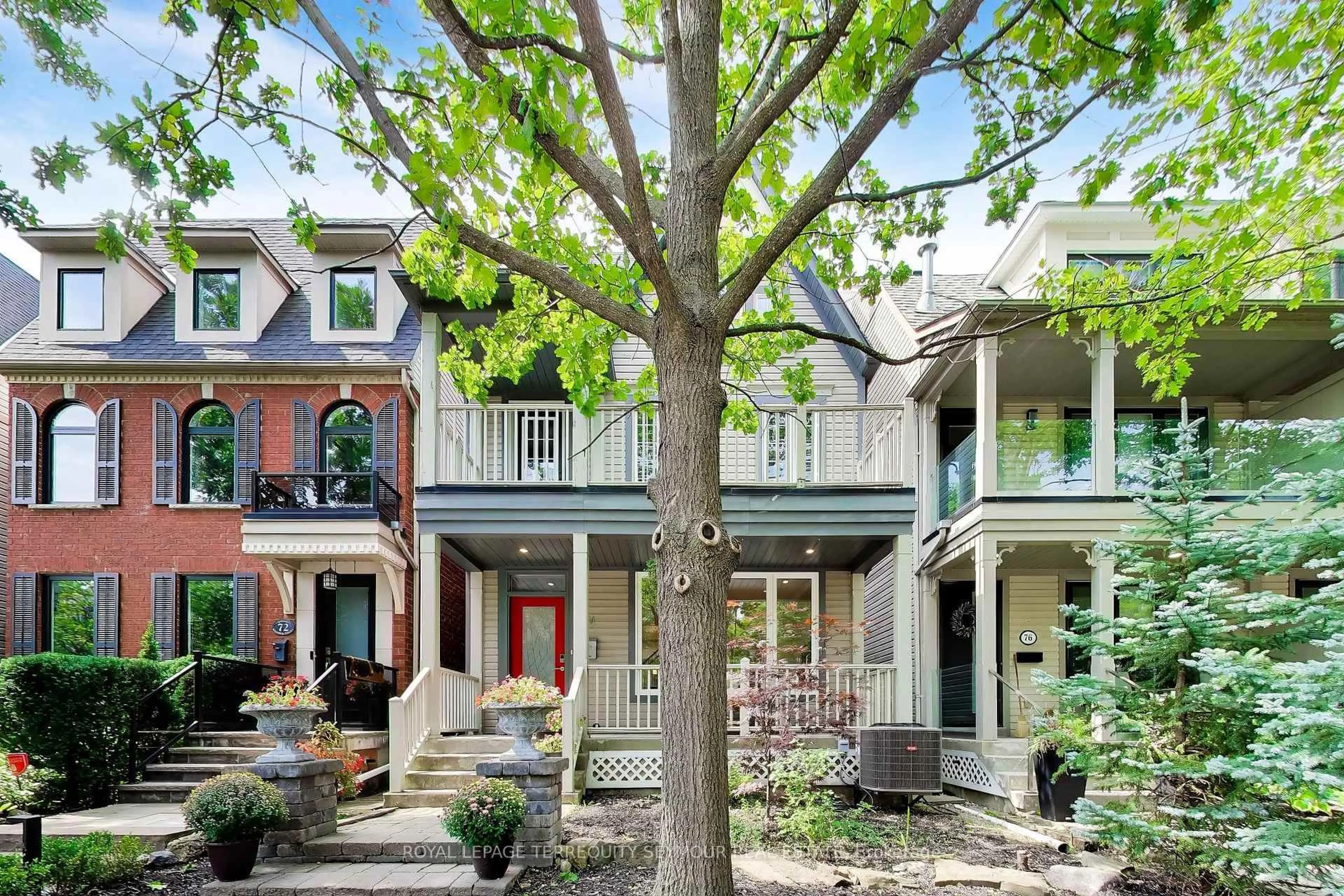 Home with brick exterior material, street for 74 Winners Circ, Toronto Ontario M4L 3Z7