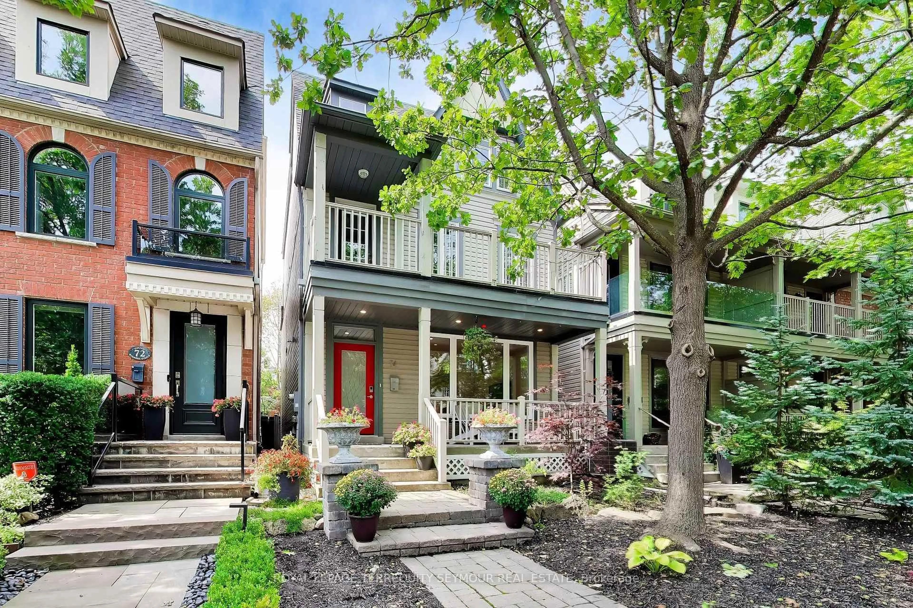 Home with brick exterior material, street for 74 Winners Circ, Toronto Ontario M4L 3Z7