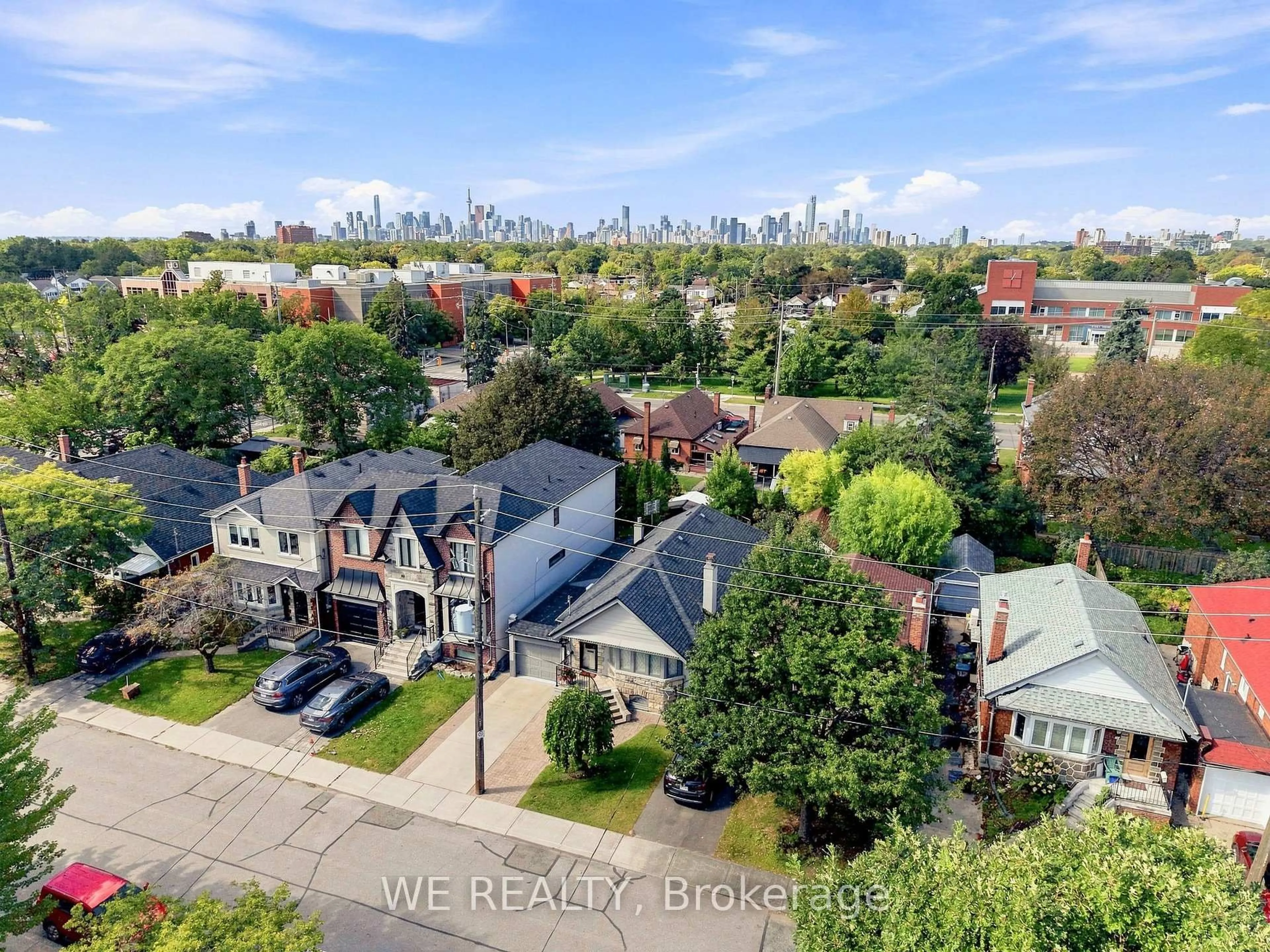 A pic from outside/outdoor area/front of a property/back of a property/a pic from drone, city buildings view from balcony for 12 Fairside Ave, Toronto Ontario M4C 3G9