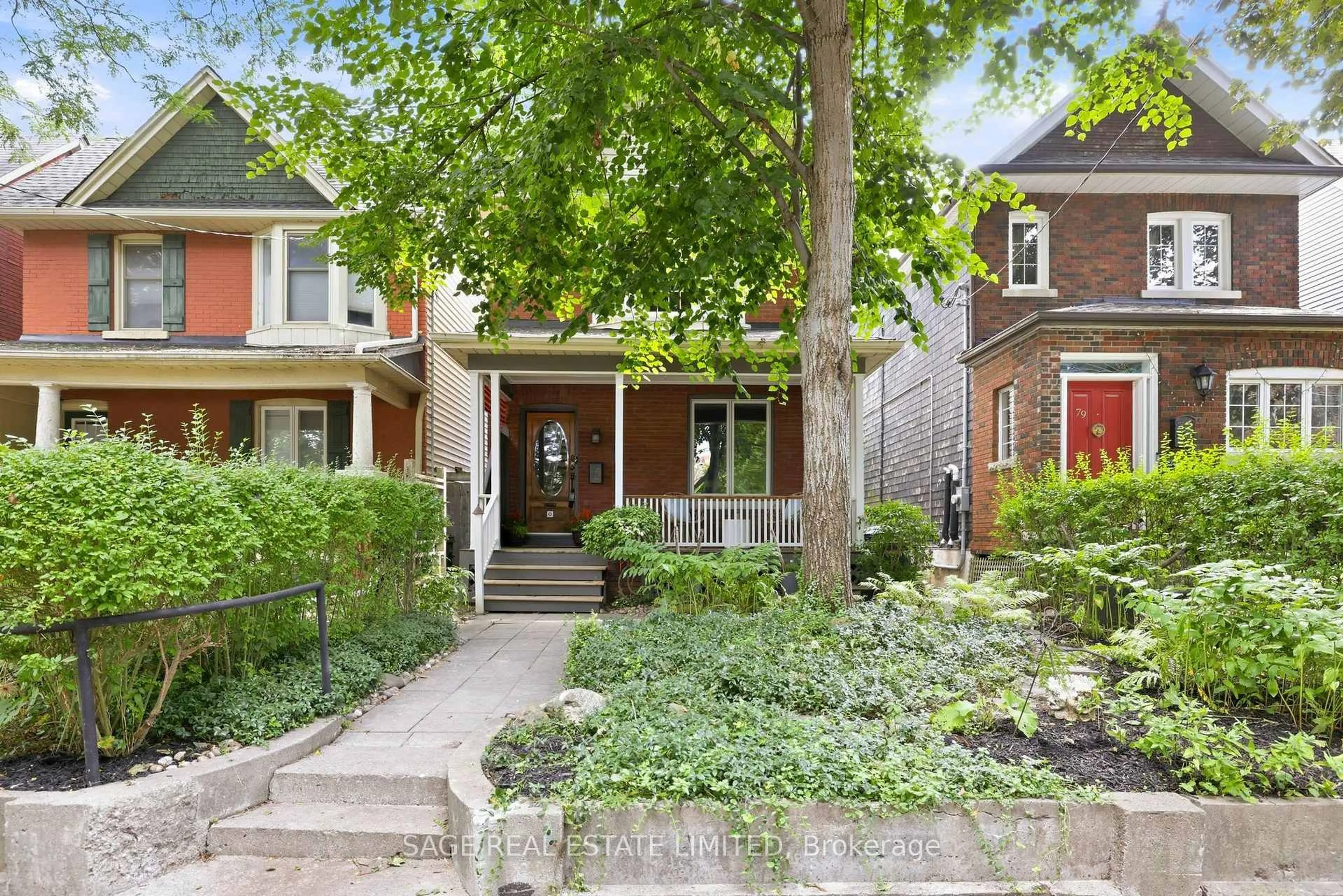 Home with brick exterior material, street for 81 Woodfield Rd, Toronto Ontario M4L 2W5