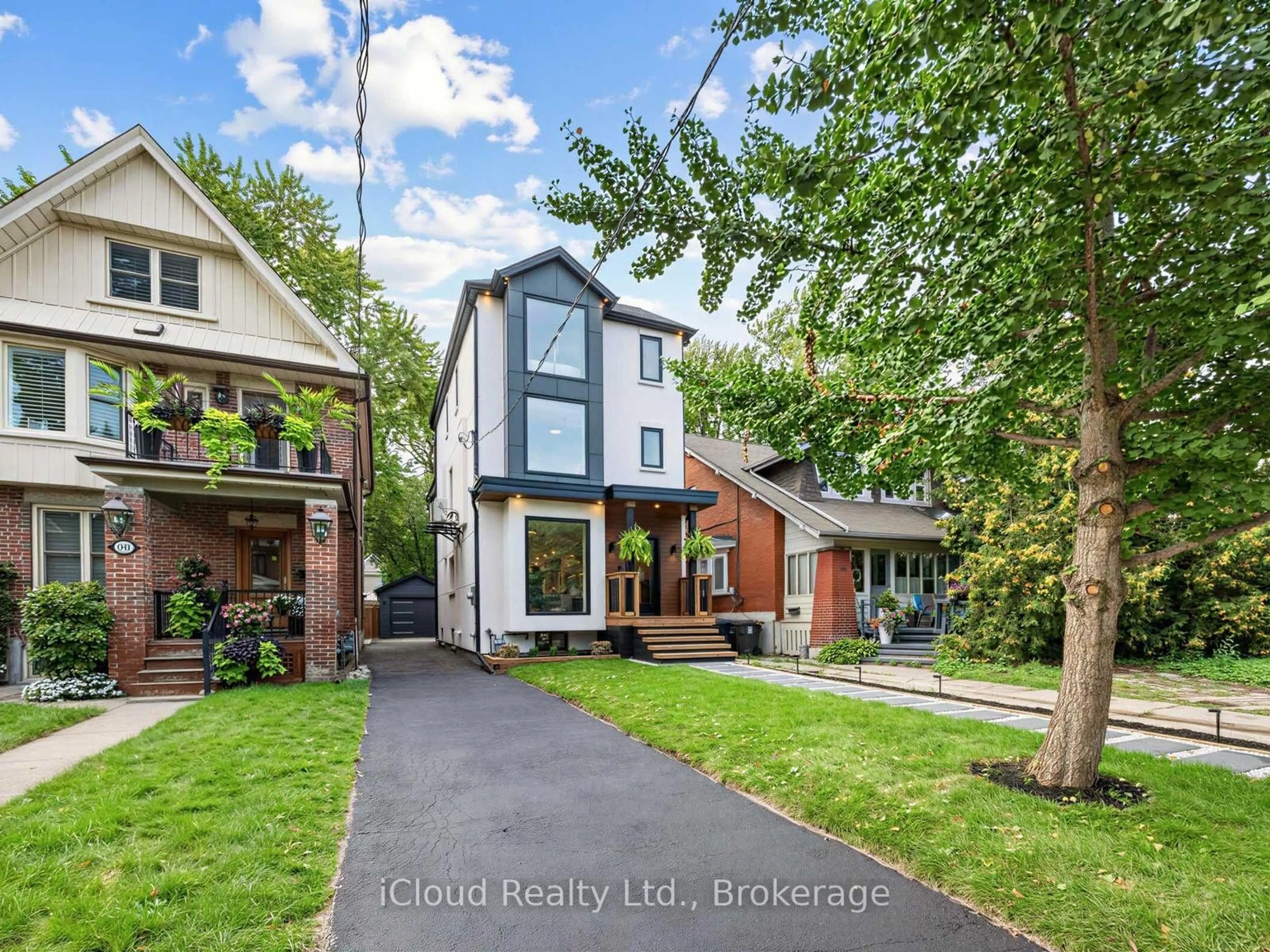 Home with brick exterior material, street for 96 Woodycrest Ave, Toronto Ontario M4J 3A9