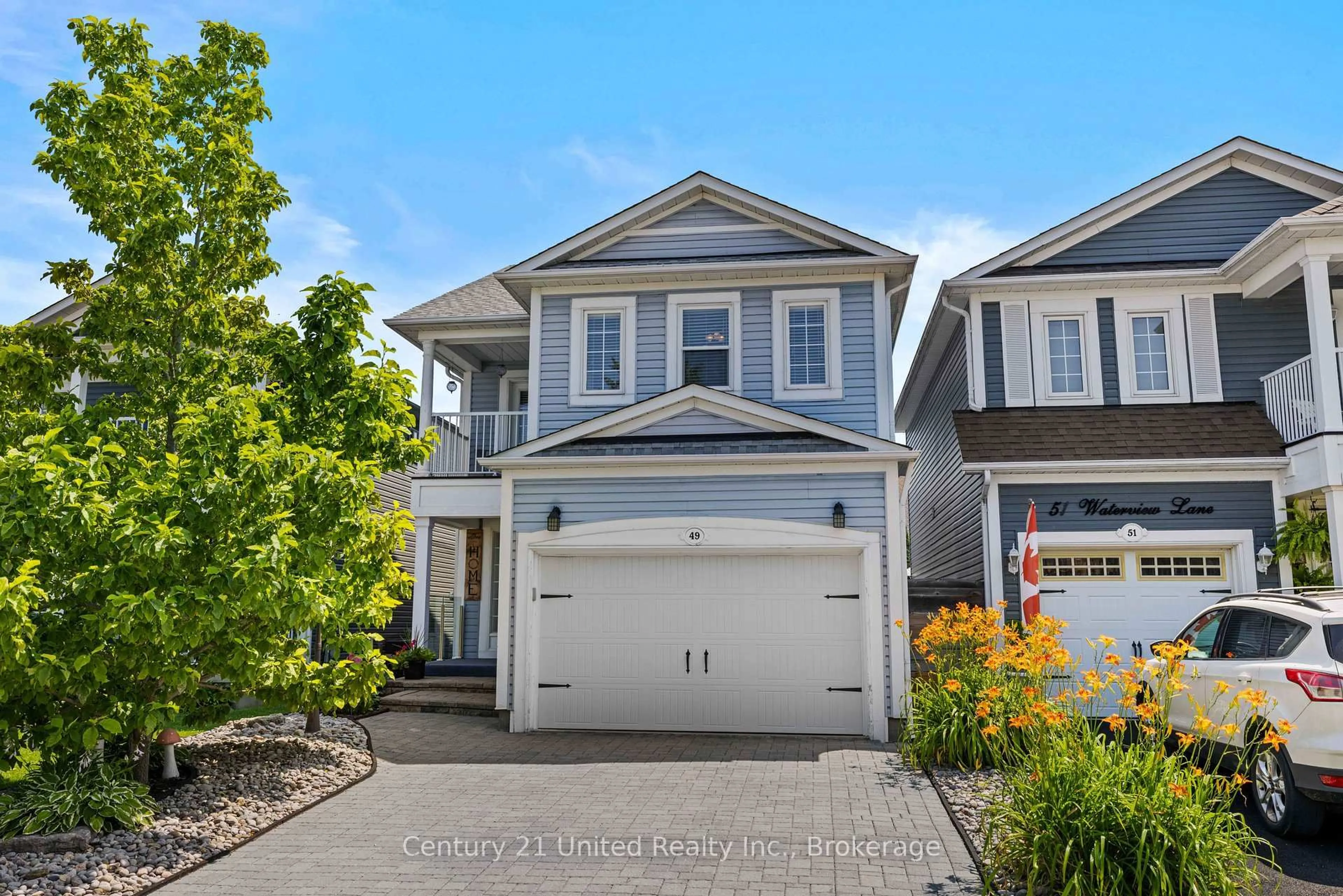Home with vinyl exterior material, street for 49 Waterview Lane, Clarington Ontario L1B 1P5