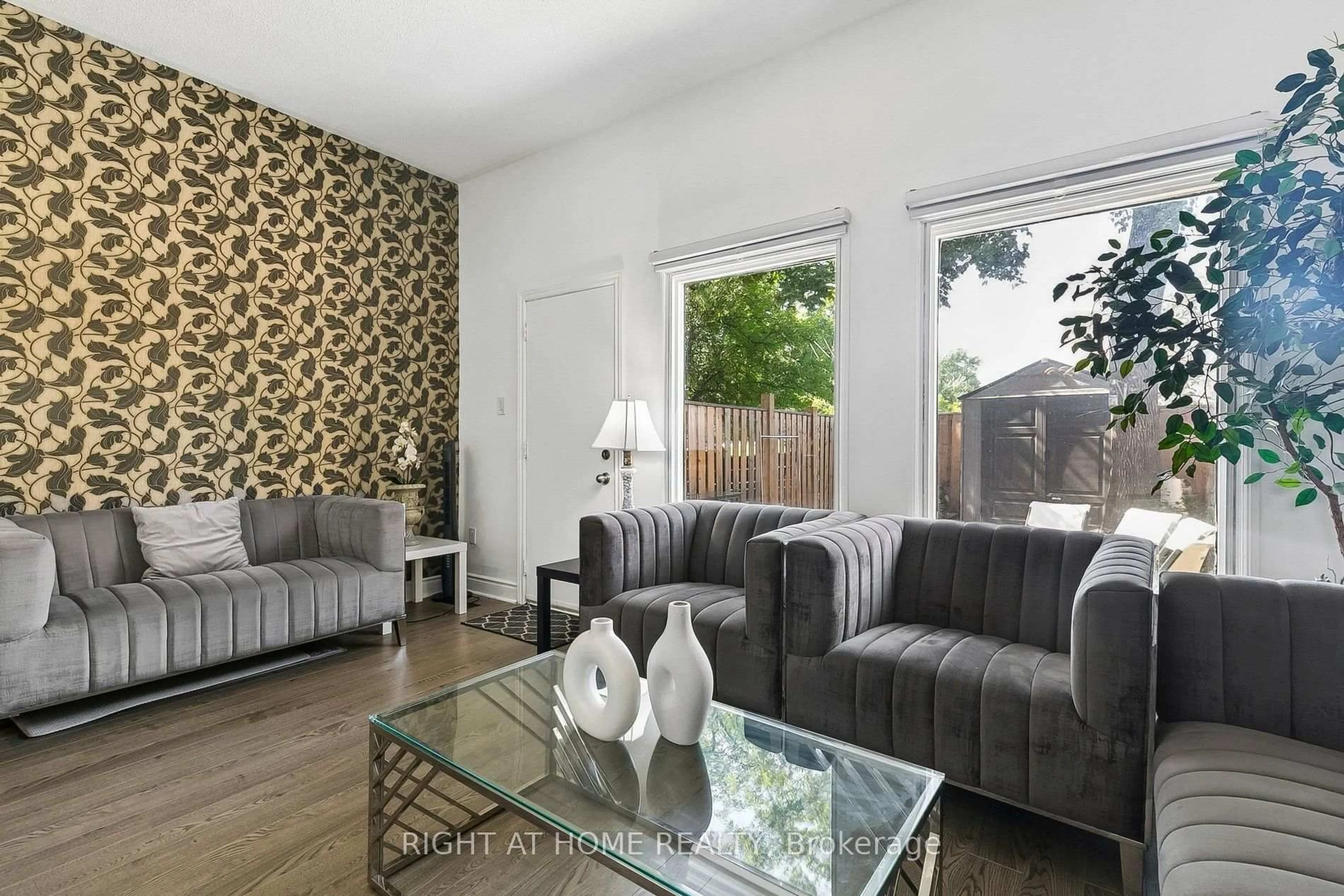 Living room with furniture, unknown for 12 l'amoreaux Dr, Toronto Ontario M1W 2L9