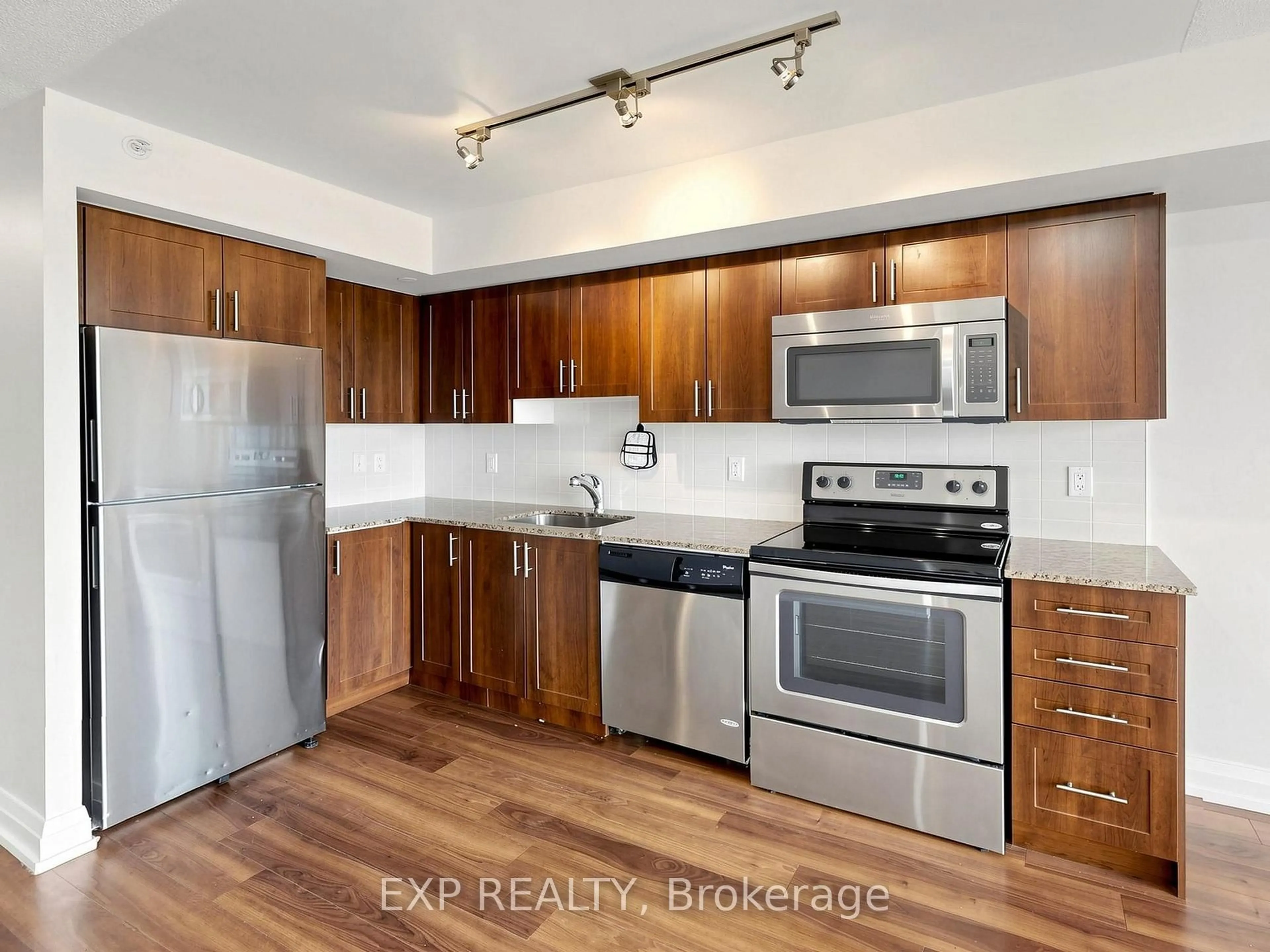 Standard kitchen, wood/laminate floor for 3520 Danforth Ave #415, Toronto Ontario M1L 1E5