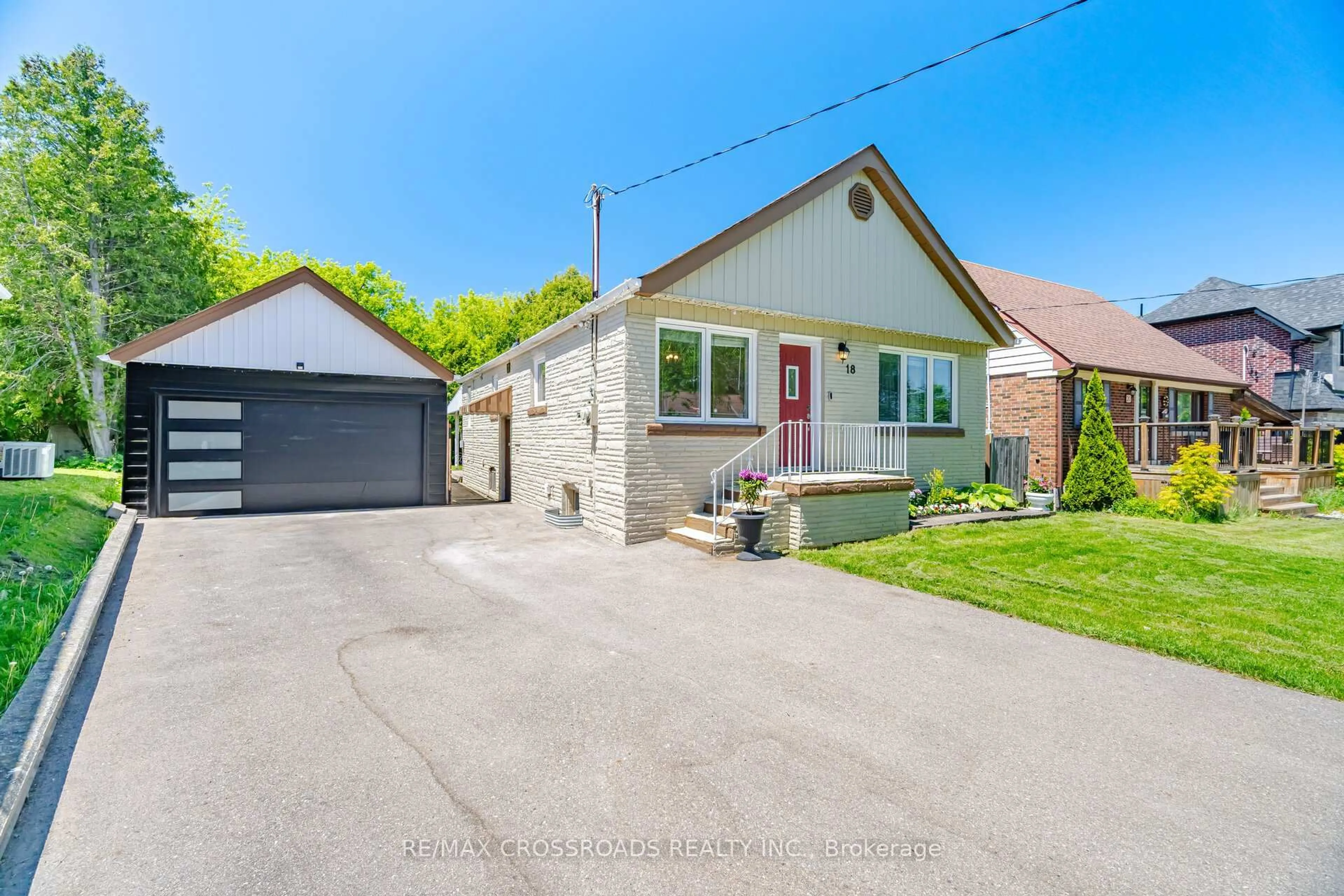 A pic from outside/outdoor area/front of a property/back of a property/a pic from drone, street for 18 Adanac Dr, Toronto Ontario M1M 2E4