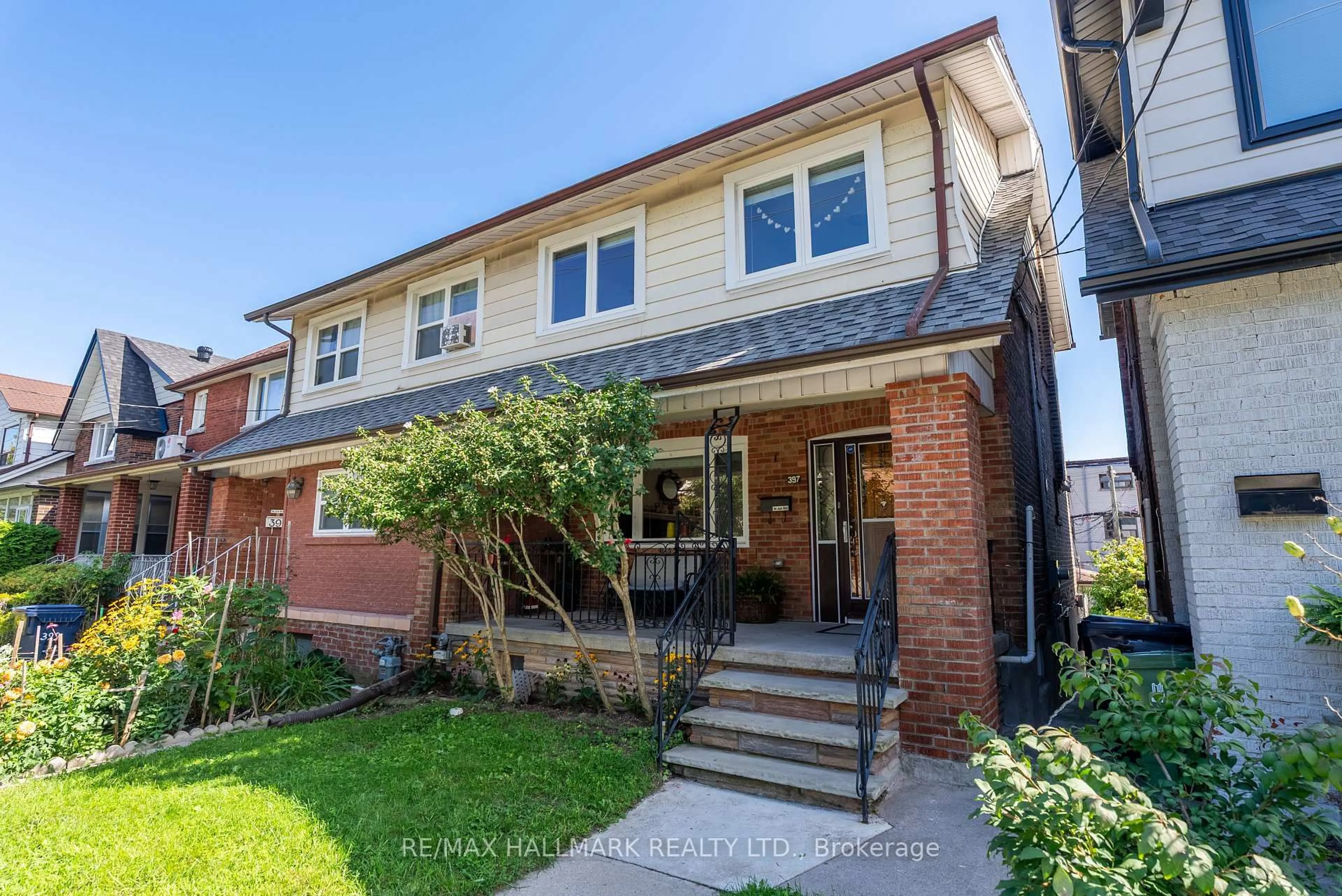 Home with brick exterior material, street for 397 Strathmore Blvd, Toronto Ontario M4C 1N6