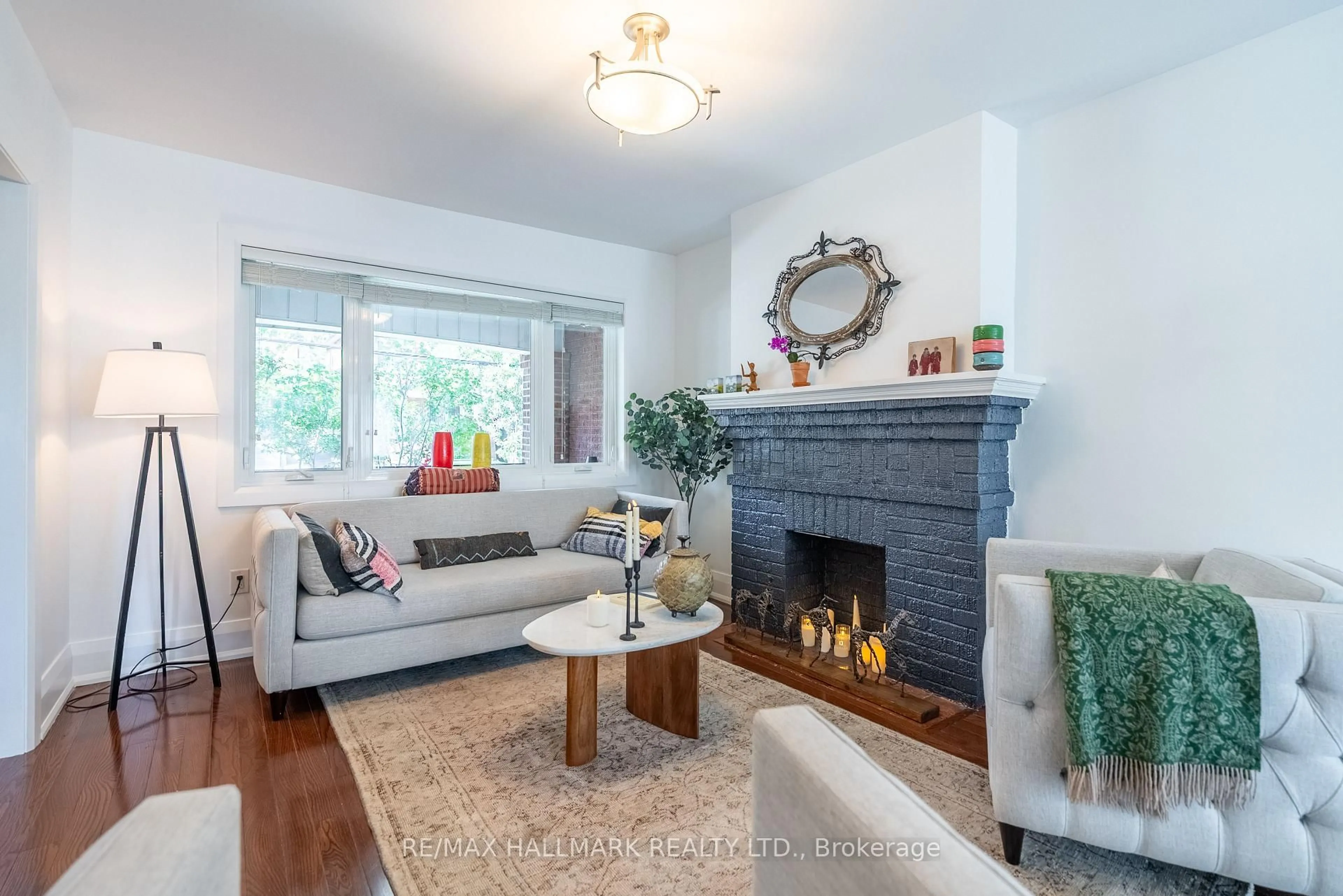 Living room with furniture, unknown for 397 Strathmore Blvd, Toronto Ontario M4C 1N6