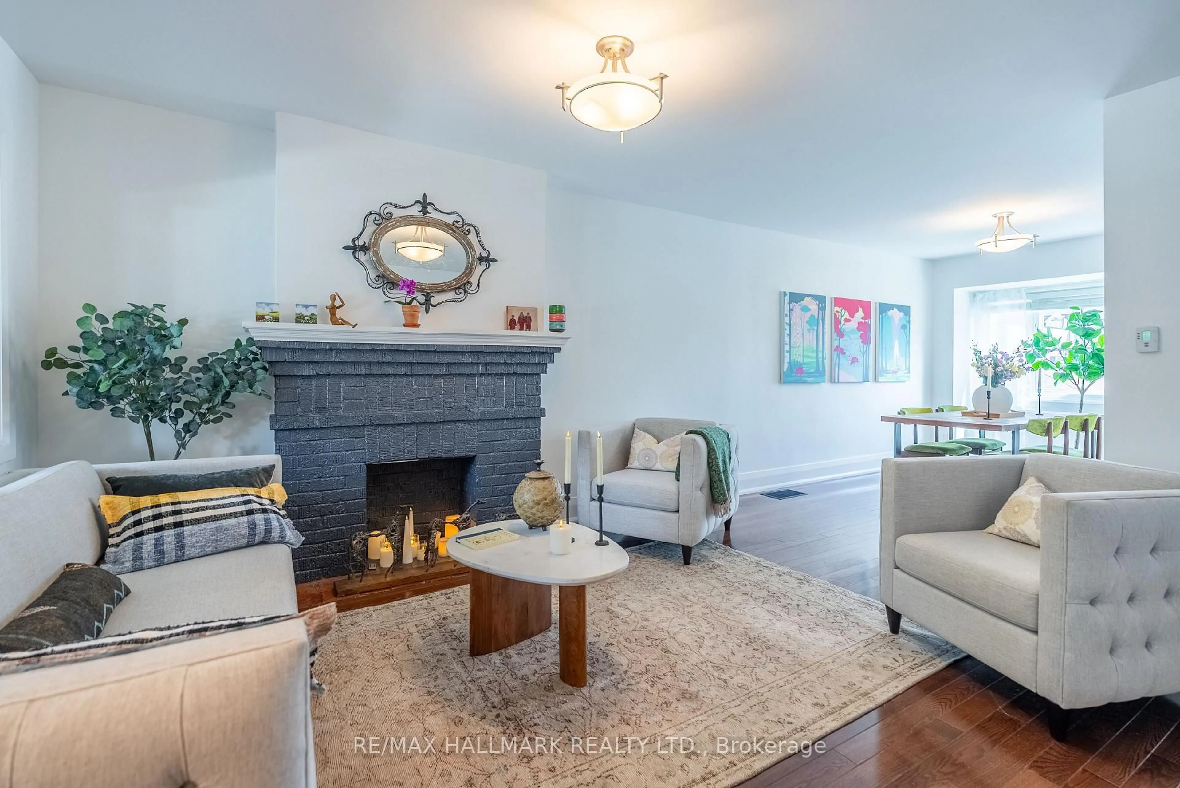 Living room with furniture, unknown for 397 Strathmore Blvd, Toronto Ontario M4C 1N6
