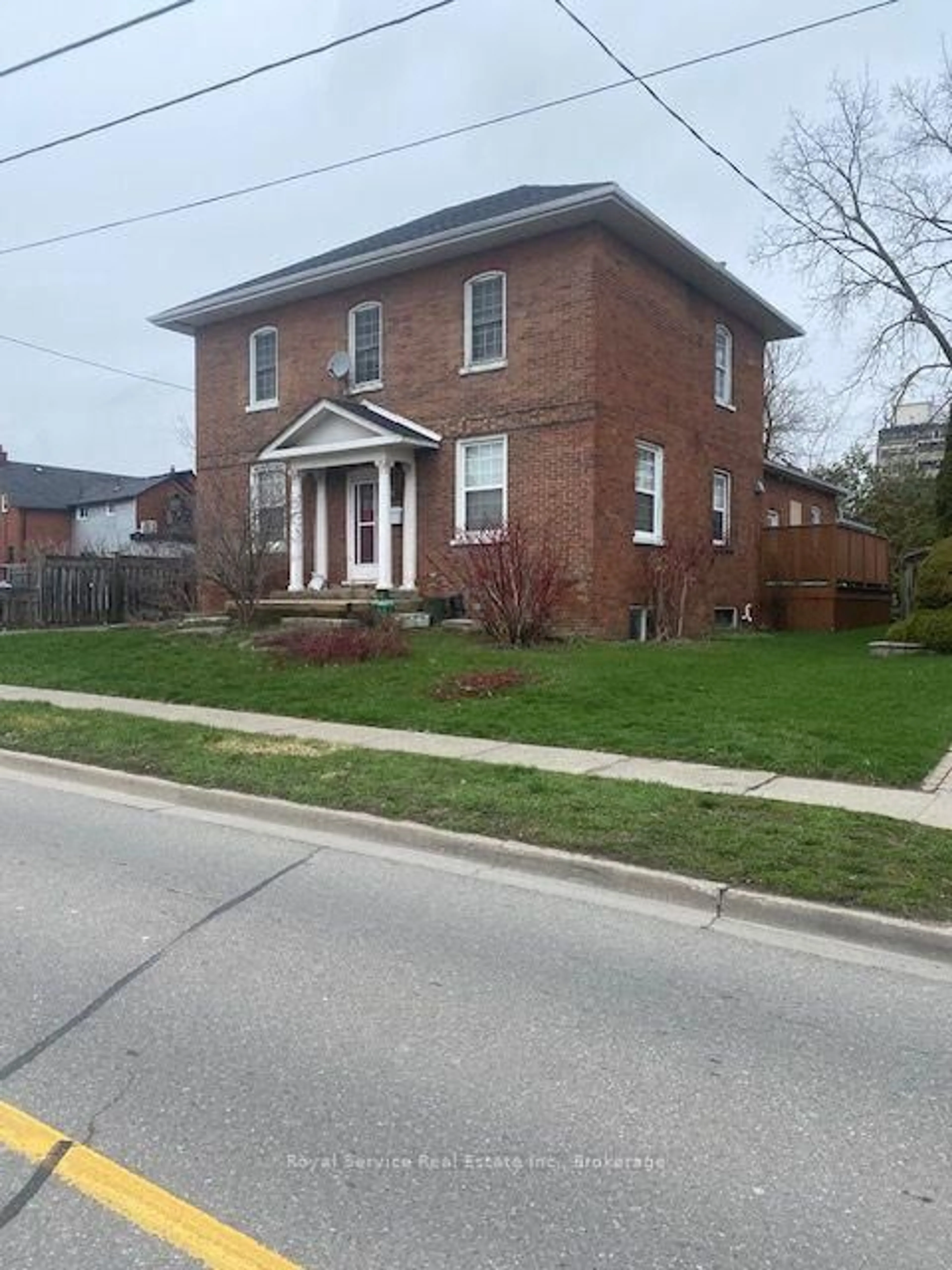 Home with brick exterior material, street for 102-C Queen St, Clarington Ontario L1C 1M6