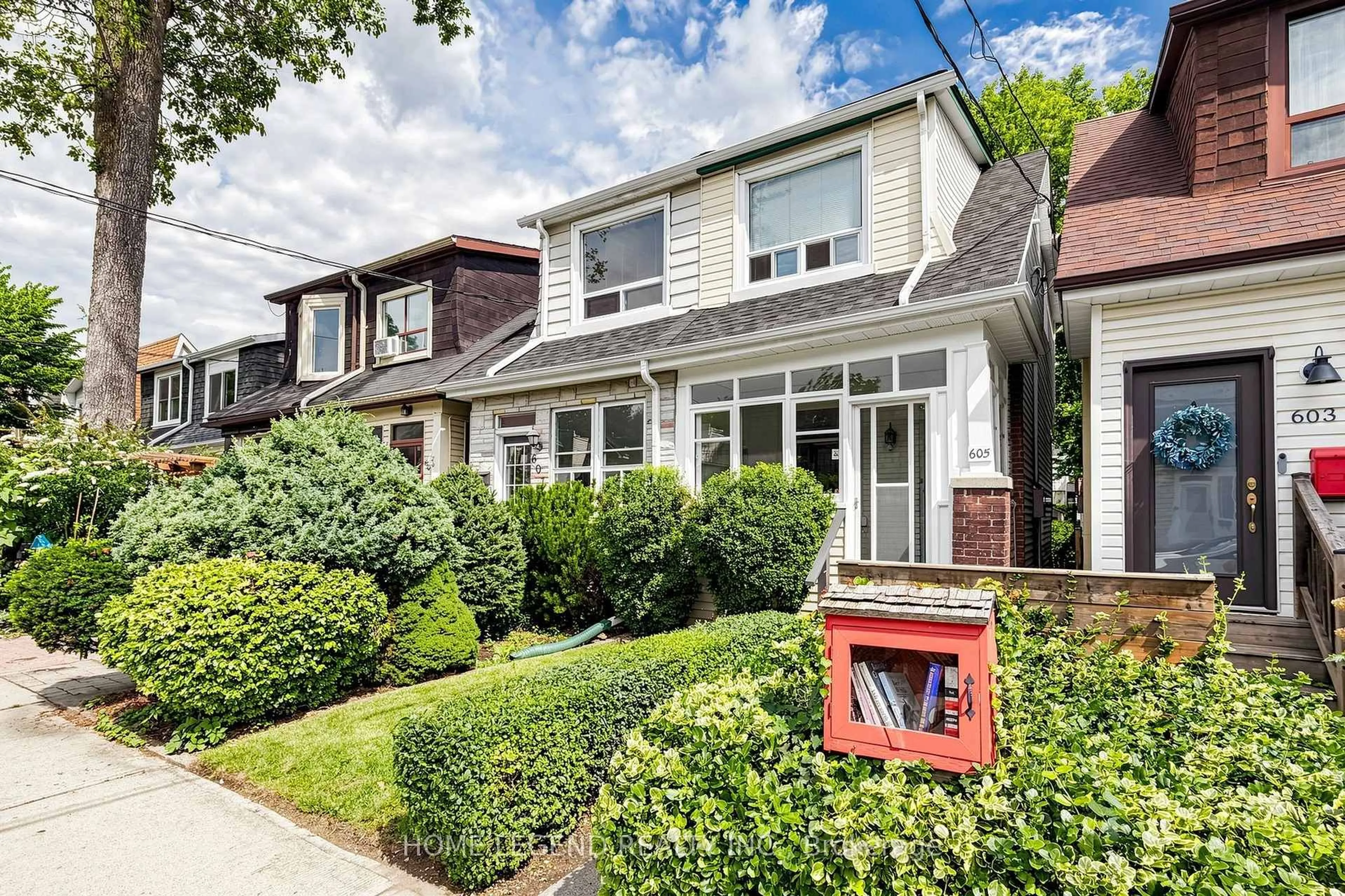 Home with brick exterior material, street for 605 Rhodes Ave, Toronto Ontario M4J 4X5