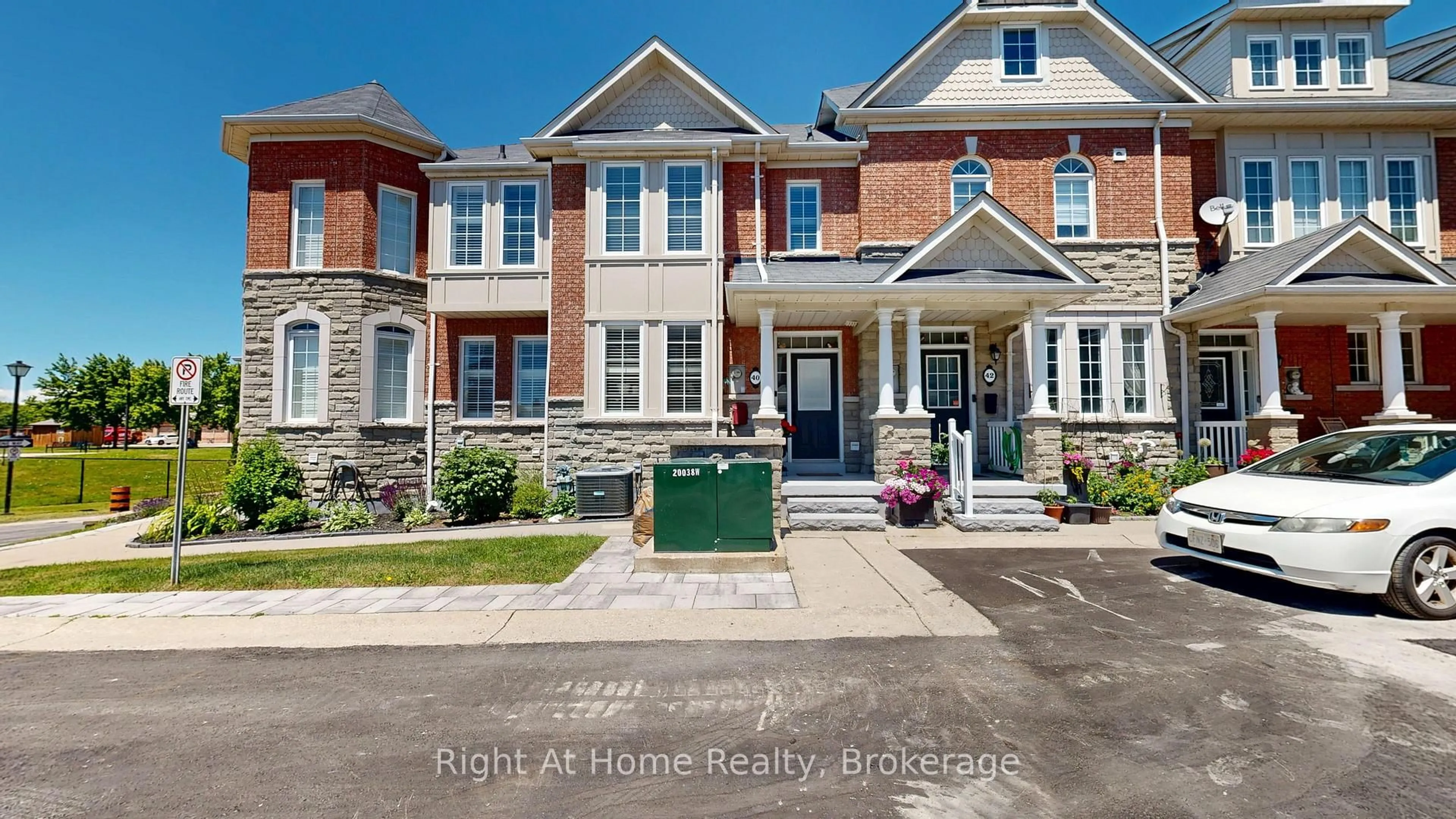 Home with brick exterior material, street for 40 Torr Lane, Ajax Ontario L1S 7M9