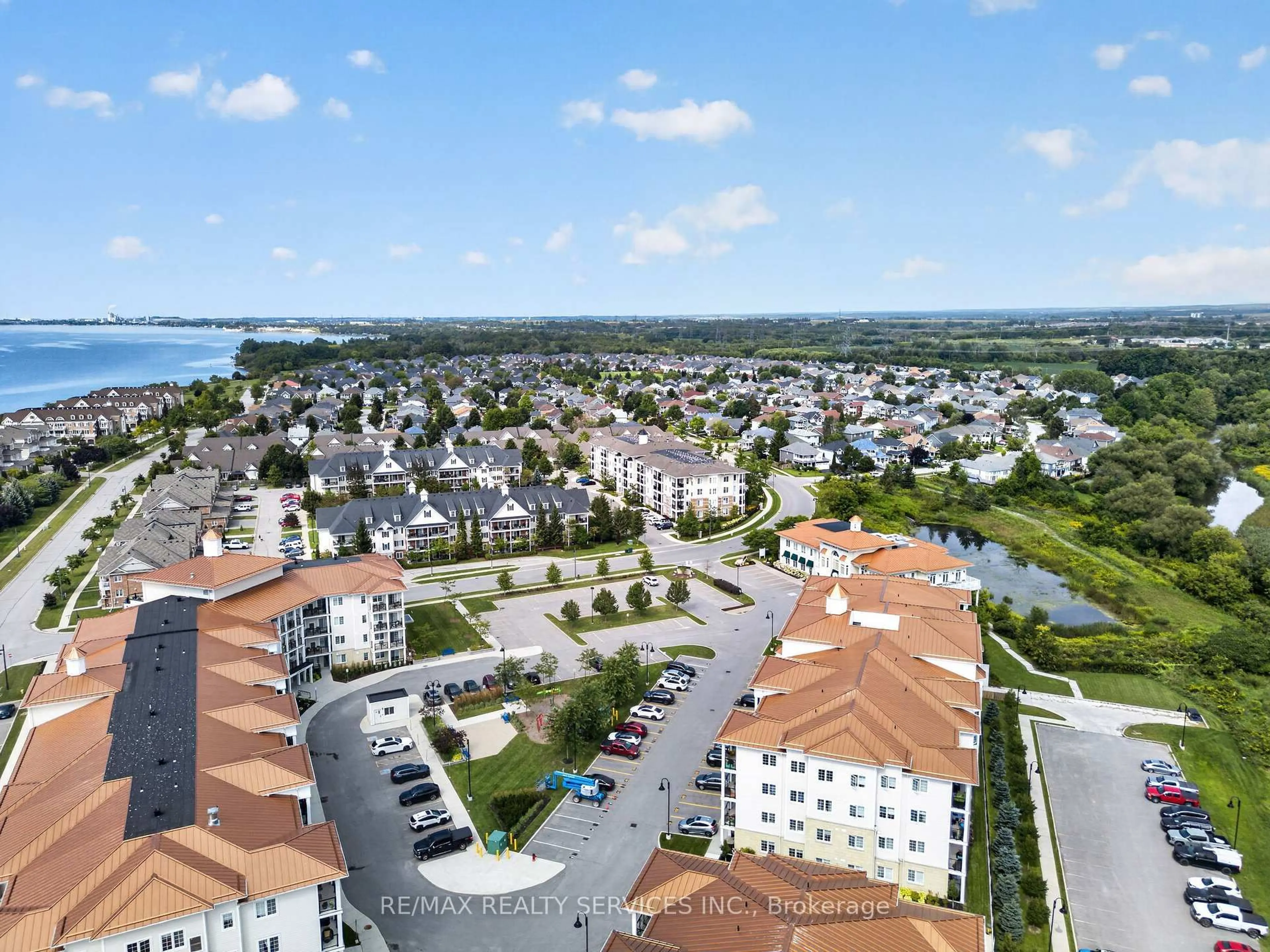 A pic from outside/outdoor area/front of a property/back of a property/a pic from drone, unknown for 50 Lakebreeze Dr #129, Clarington Ontario L1B 0V9
