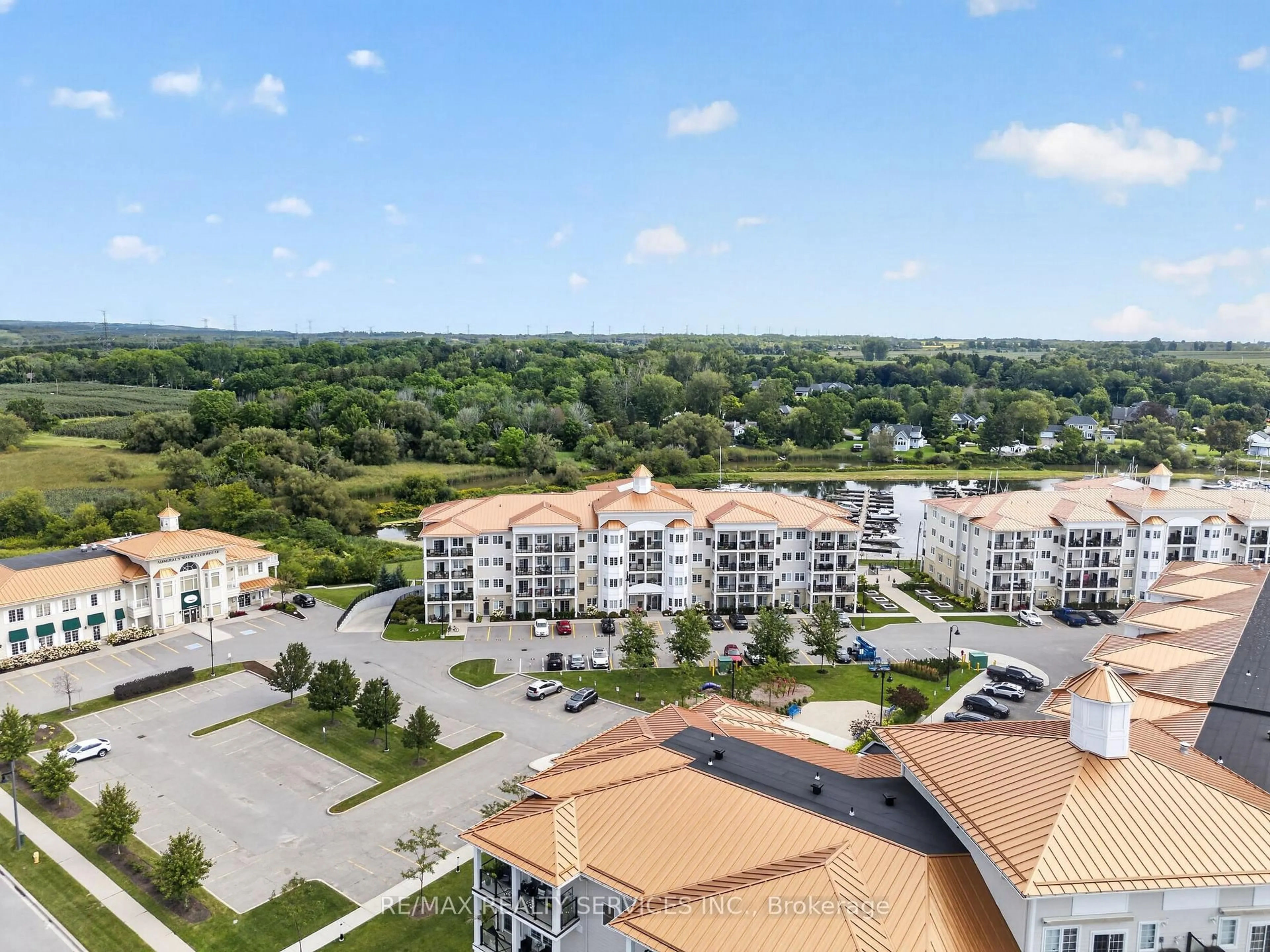A pic from outside/outdoor area/front of a property/back of a property/a pic from drone, city buildings view from balcony for 50 Lakebreeze Dr #129, Clarington Ontario L1B 0V9