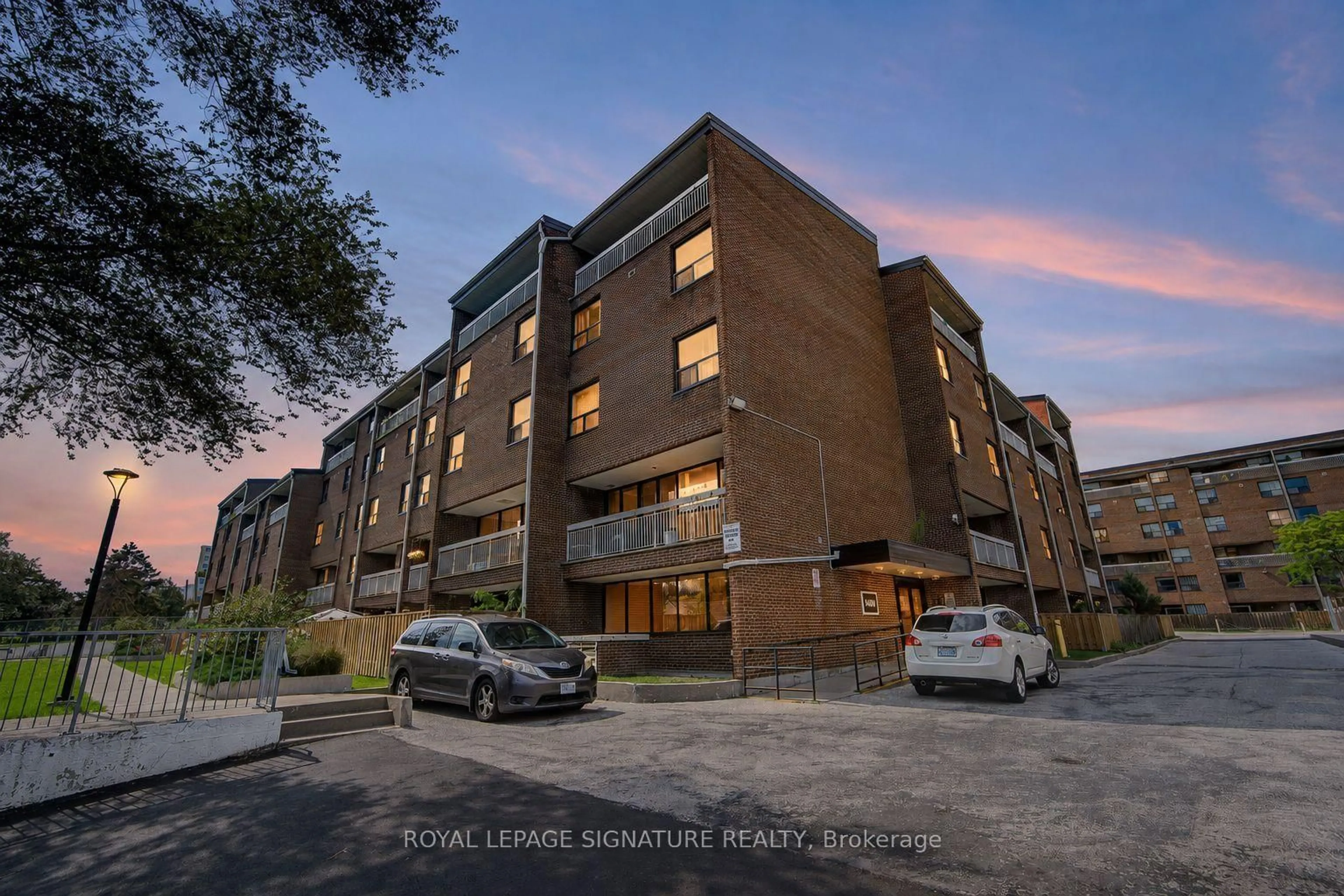 A pic from outside/outdoor area/front of a property/back of a property/a pic from drone, building for 4060 Lawrence Ave #413, Toronto Ontario M1E 4V4