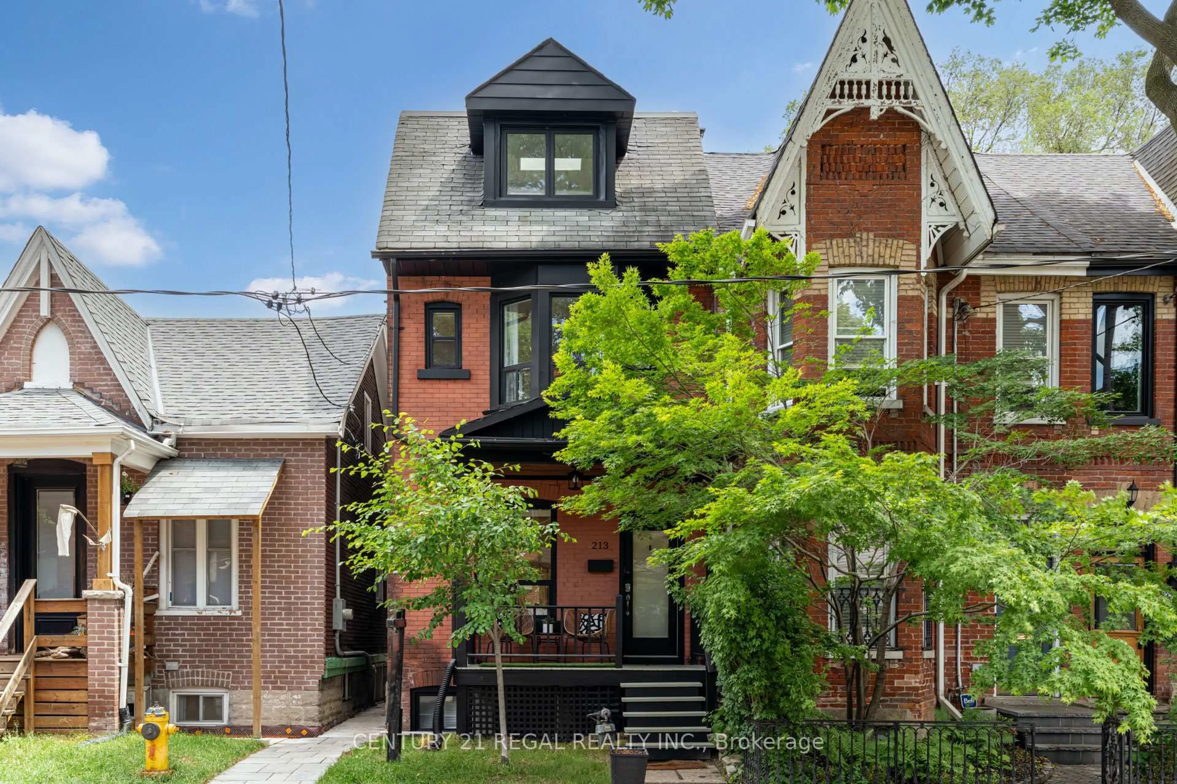 Home with brick exterior material, street for 213 Boulton Ave, Toronto Ontario M4M 2J8