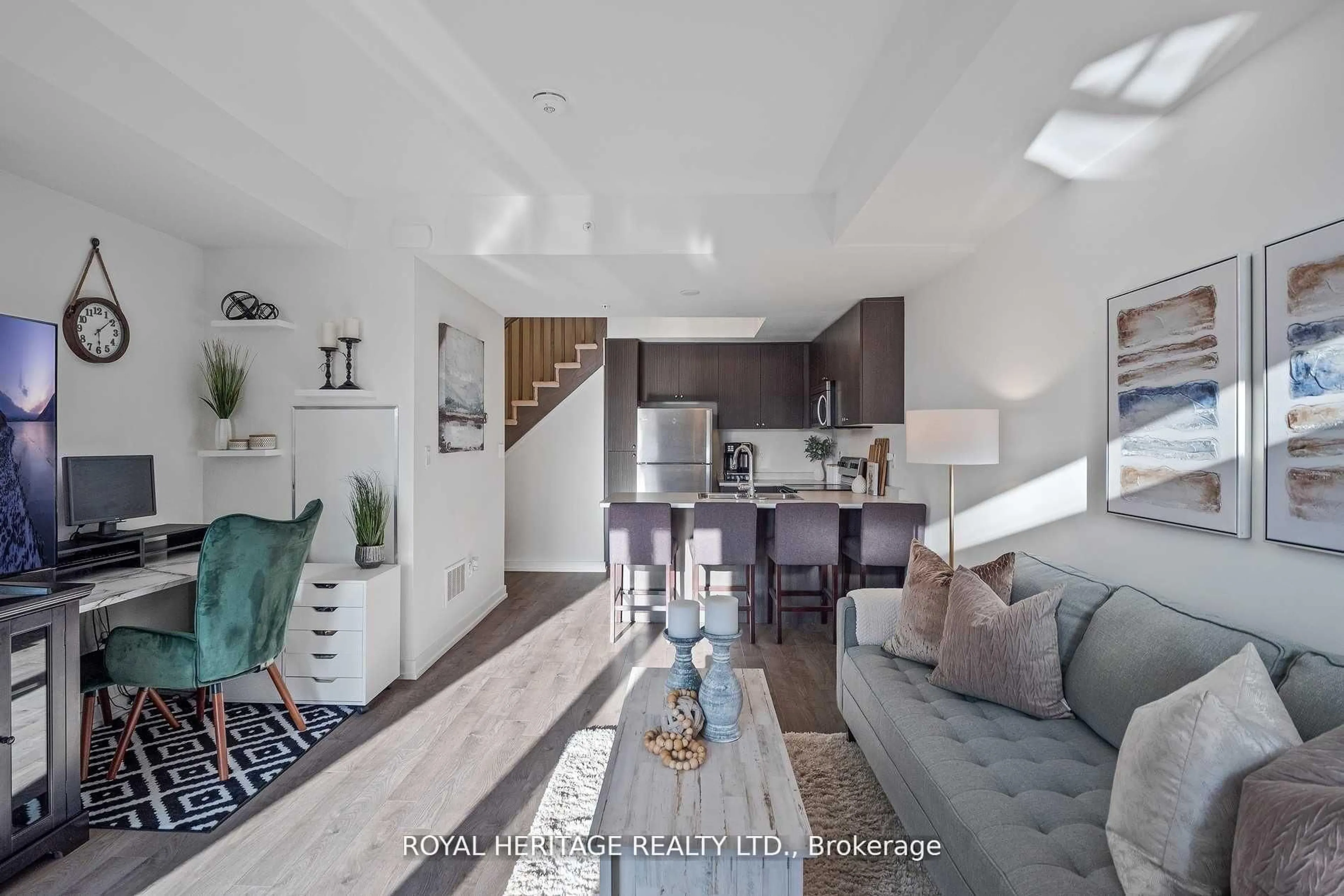 Living room with furniture, wood/laminate floor for 1555 Kingston Rd #103, Pickering Ontario L1V 0E9