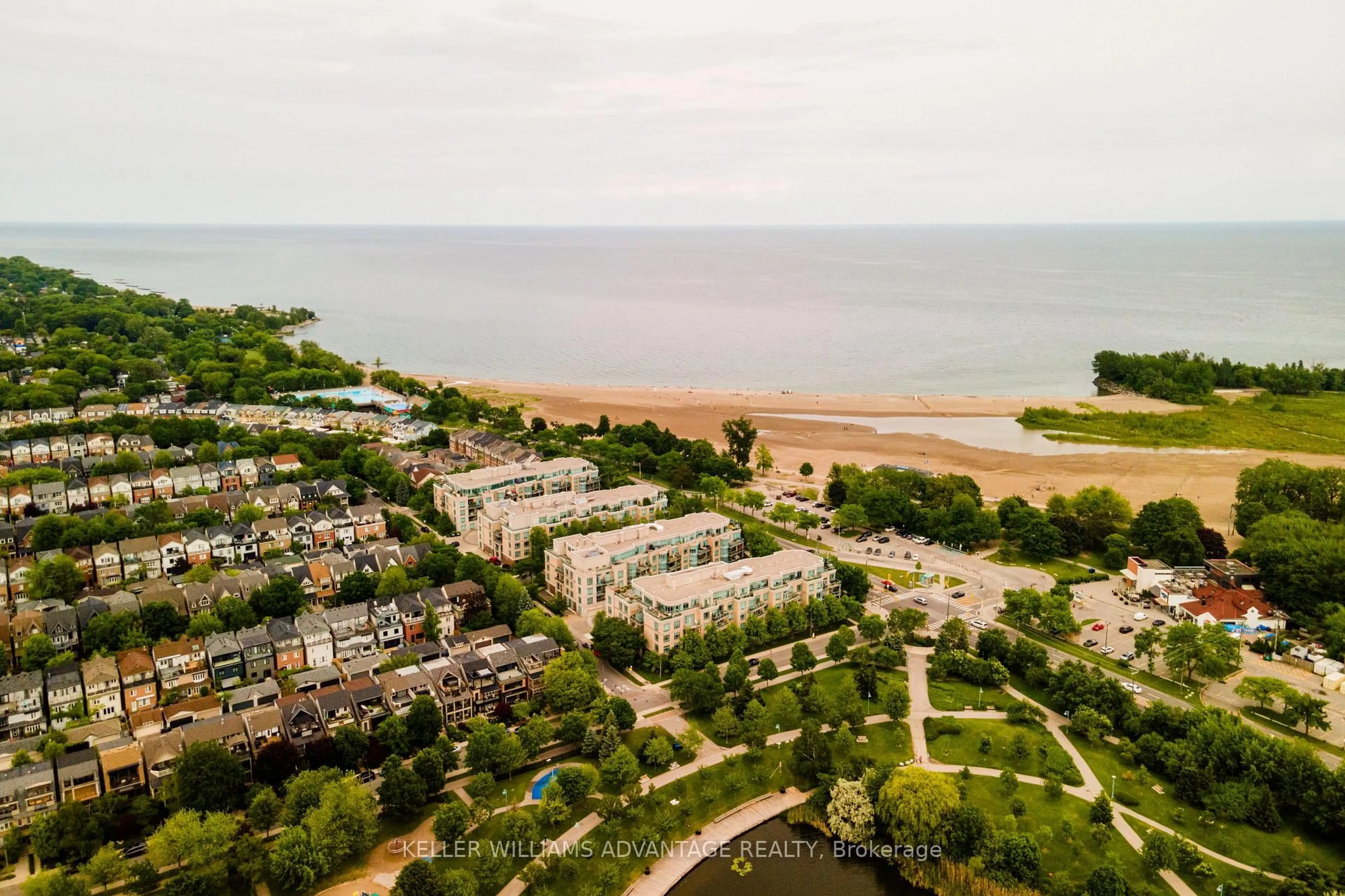 A pic from outside/outdoor area/front of a property/back of a property/a pic from drone, water/lake/river/ocean view for 9 Boardwalk Dr #321, Toronto Ontario M4L 6T1