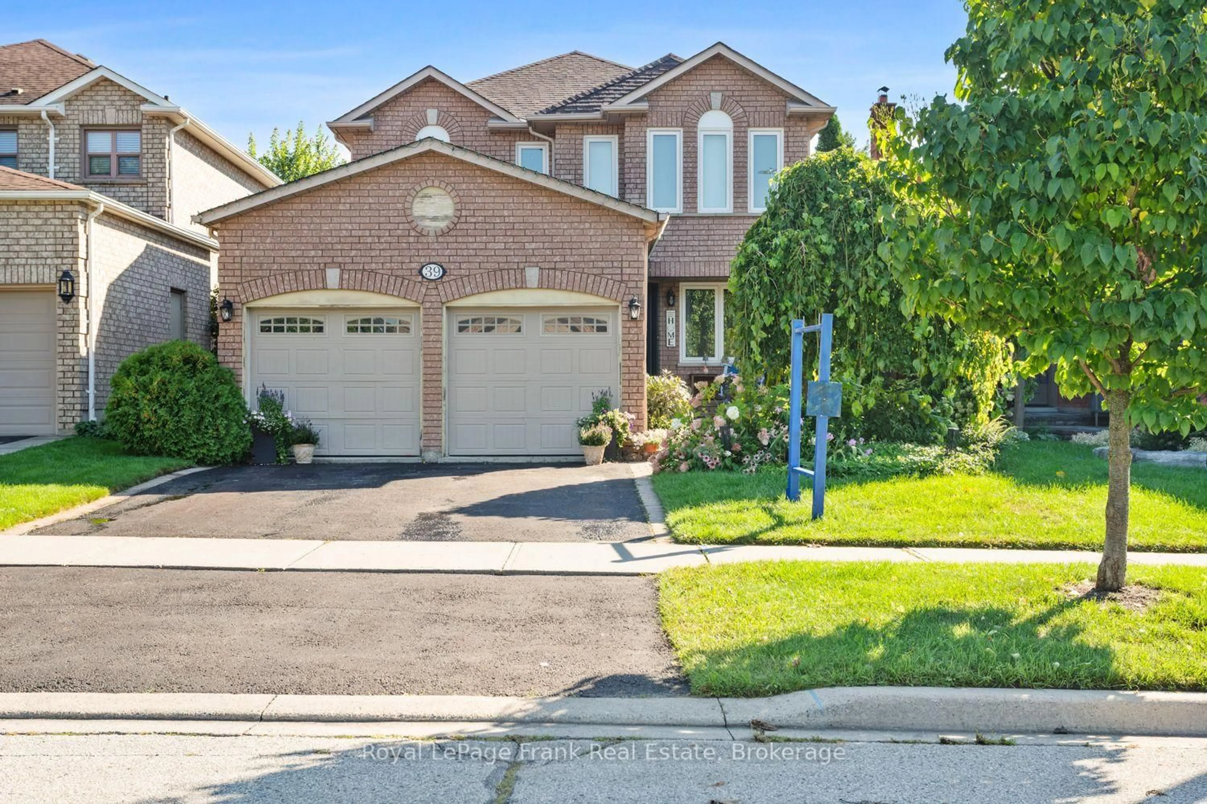 Home with brick exterior material, street for 39 Mcivor St, Whitby Ontario L1R 2L7