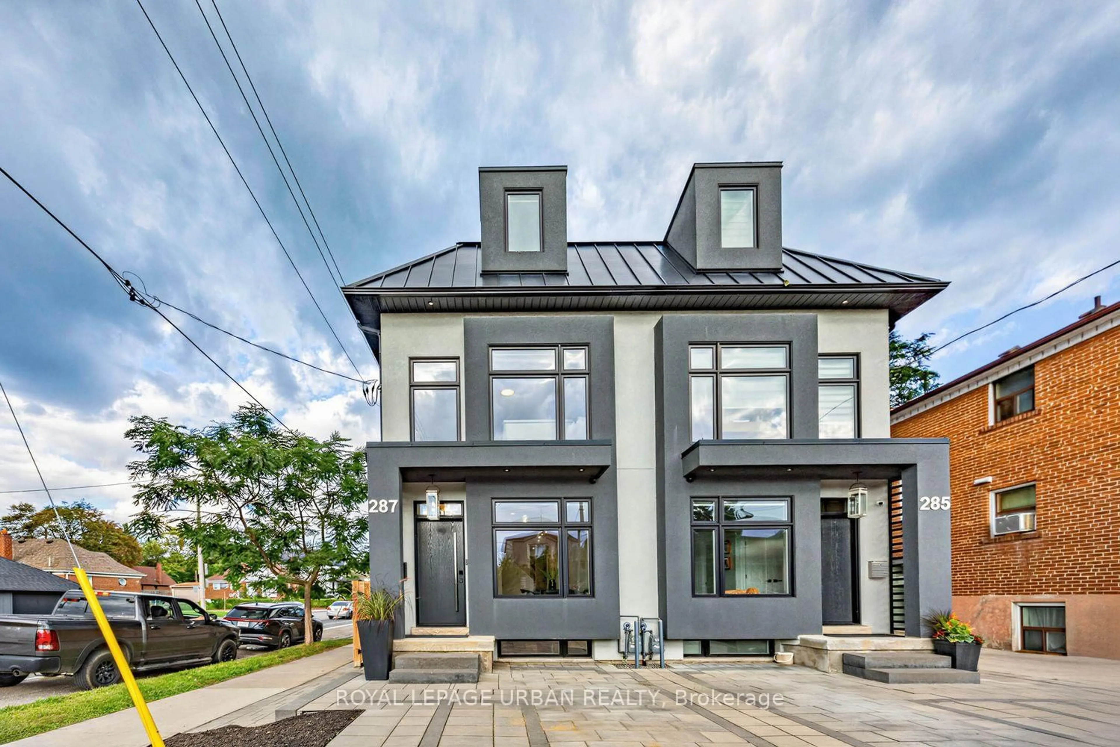 Home with brick exterior material, street for 287 Glebemount Ave, Toronto Ontario M4C 3T9