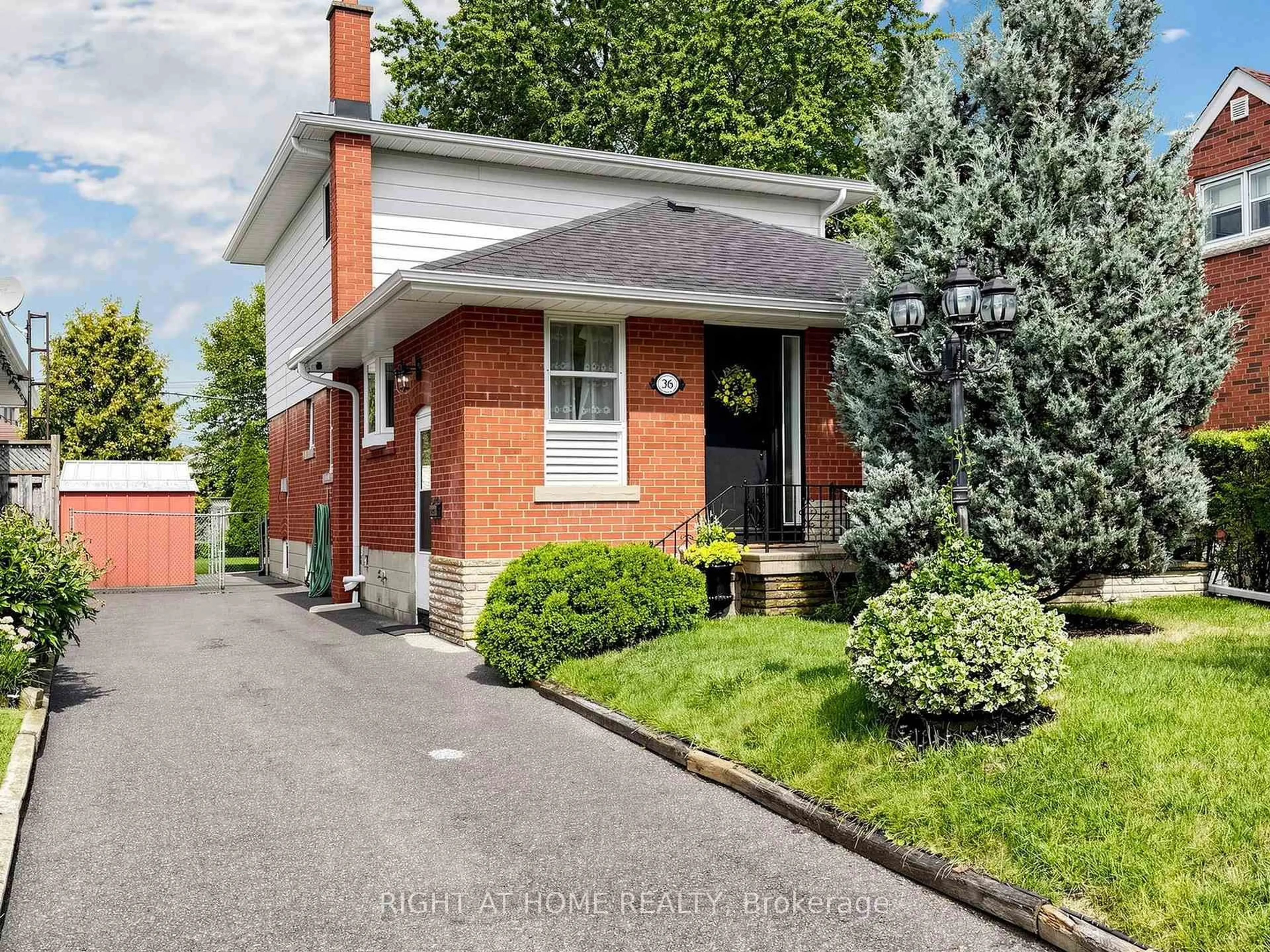 Home with brick exterior material, street for 36 Joanna Dr, Toronto Ontario M1R 4J1