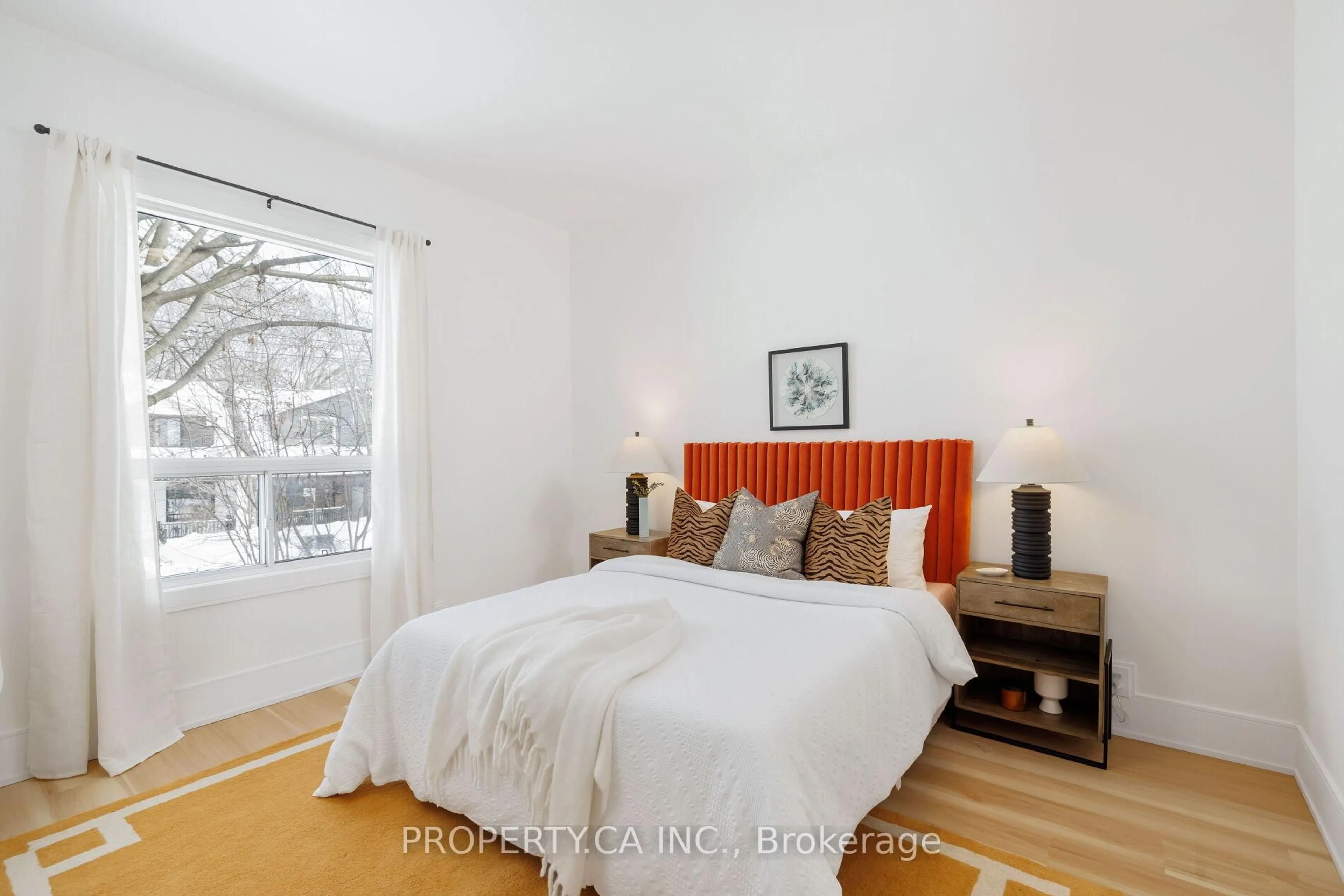 Bedroom with bed, wood/laminate floor for 332 Woodfield Rd, Toronto Ontario M4L 2X1