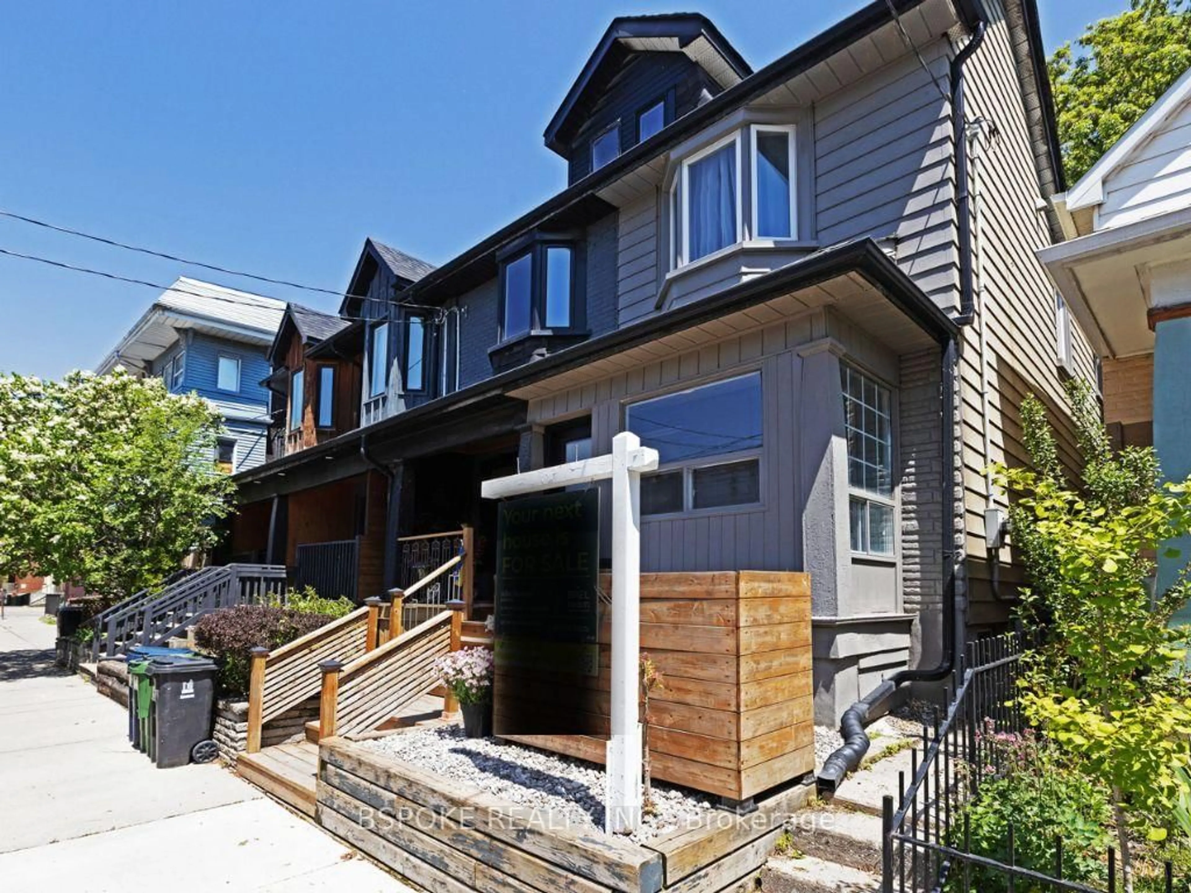 Home with brick exterior material, street for 75 Laing St, Toronto Ontario M4L 2N4