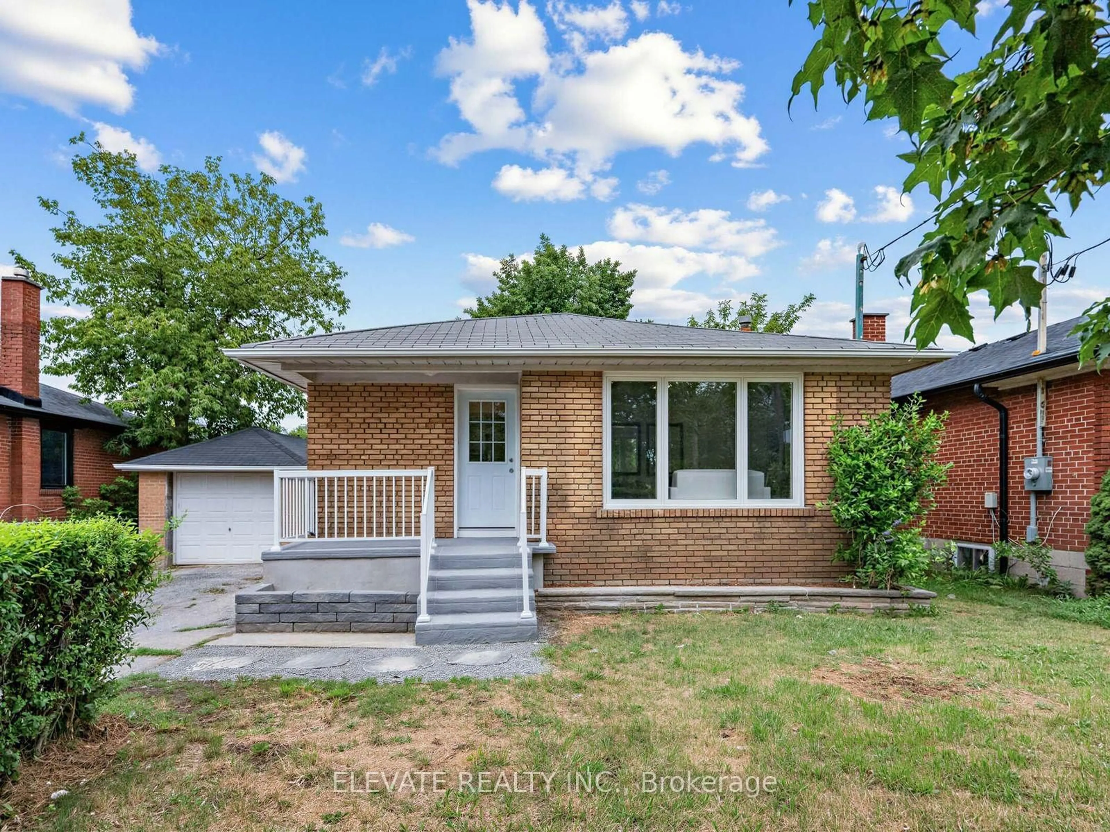 Home with brick exterior material, street for 730 Danforth Rd, Toronto Ontario M1K 1G5