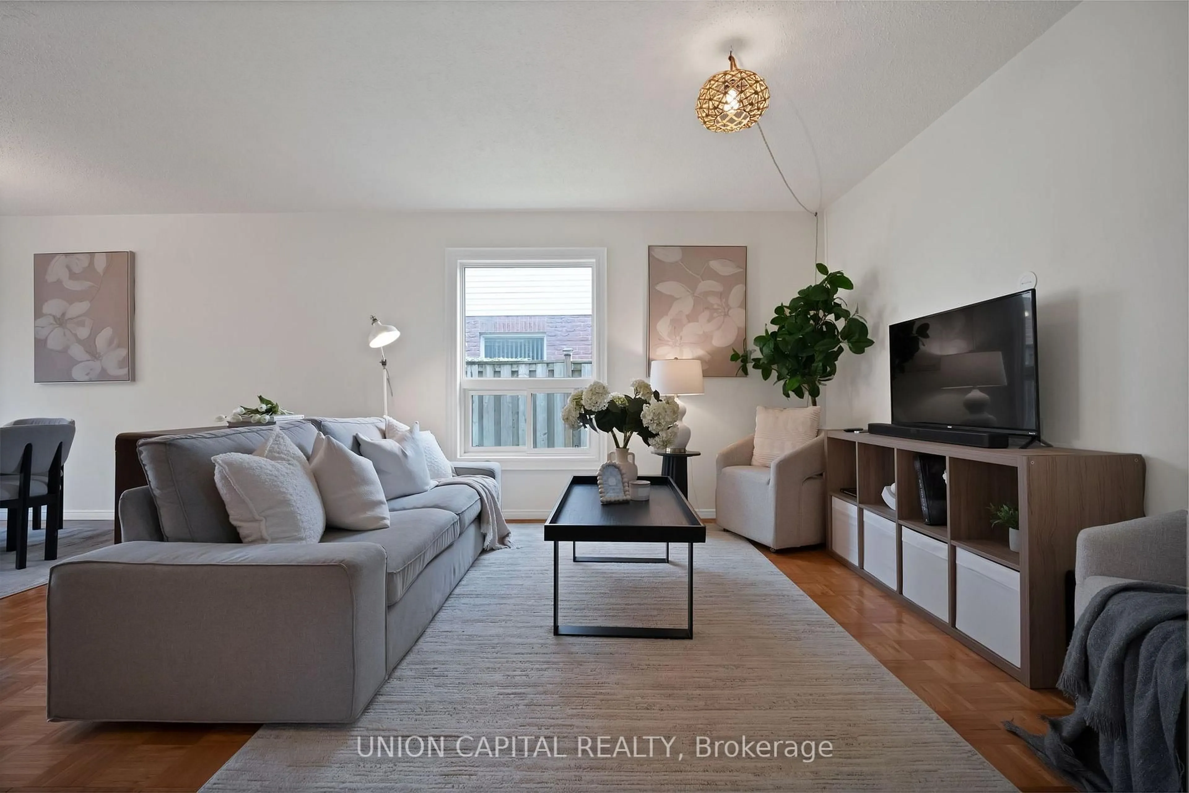 Living room with furniture, wood/laminate floor for 73 Humphrey Dr, Ajax Ontario L1S 4Y8
