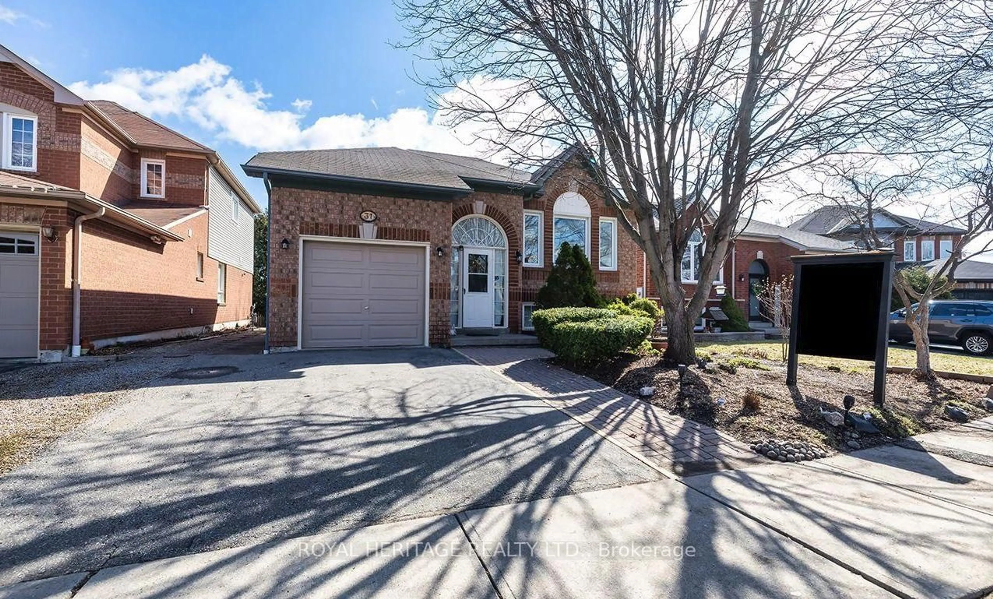 Home with brick exterior material, street for 31 Thames Dr, Whitby Ontario L1R 2M2