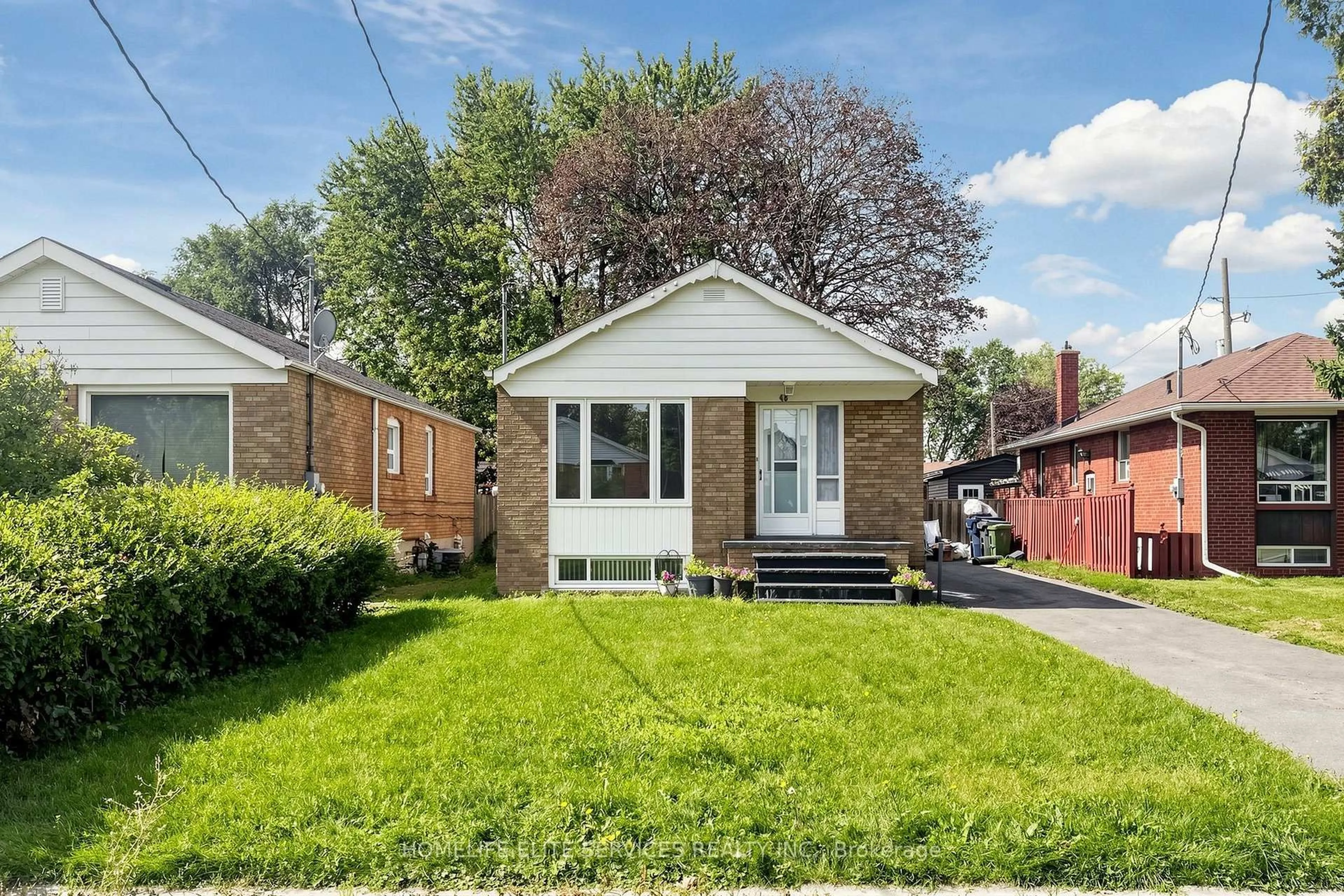 Home with brick exterior material, street for 48 Frey Cres, Toronto Ontario M1R 2C7
