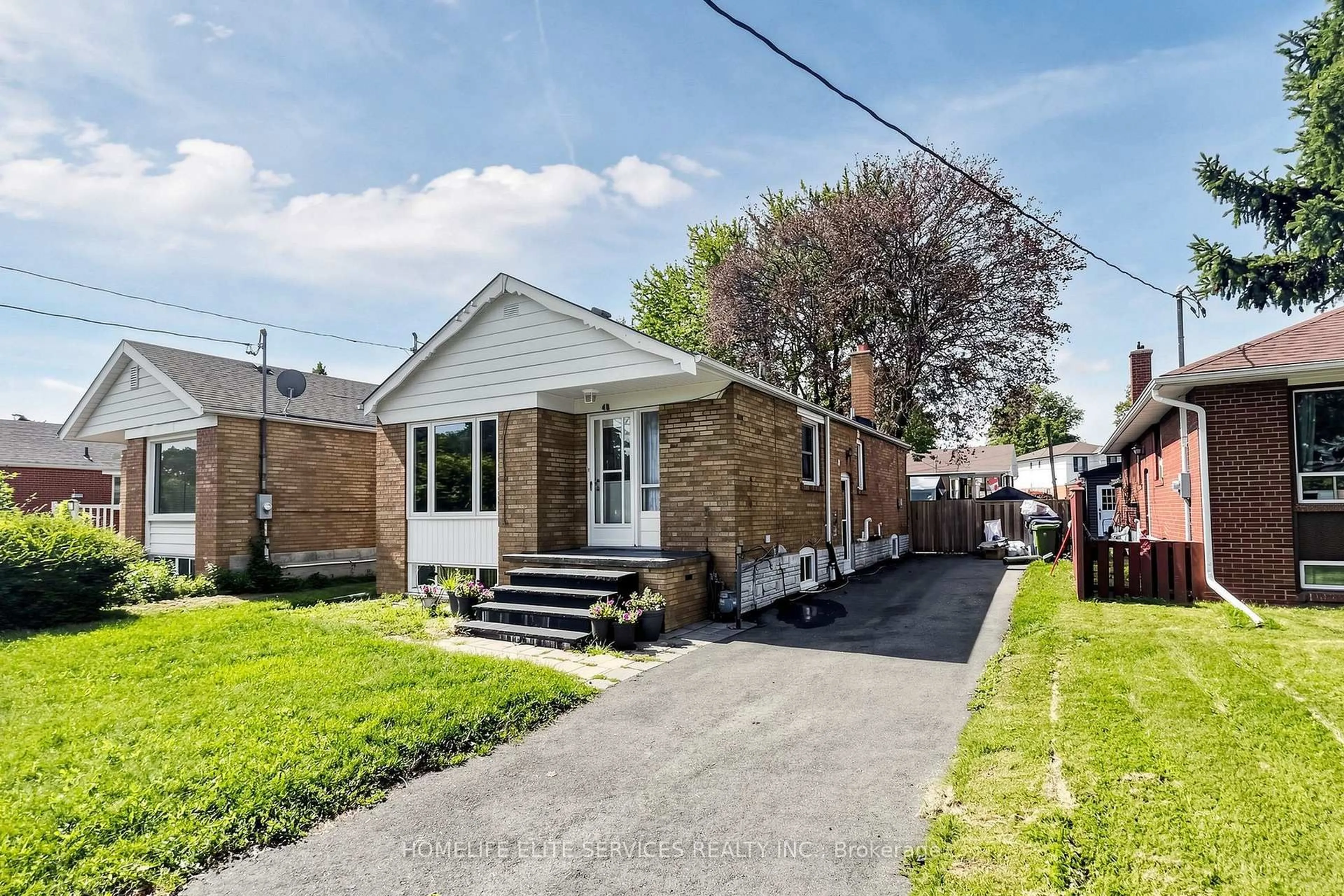 Home with brick exterior material, street for 48 Frey Cres, Toronto Ontario M1R 2C7