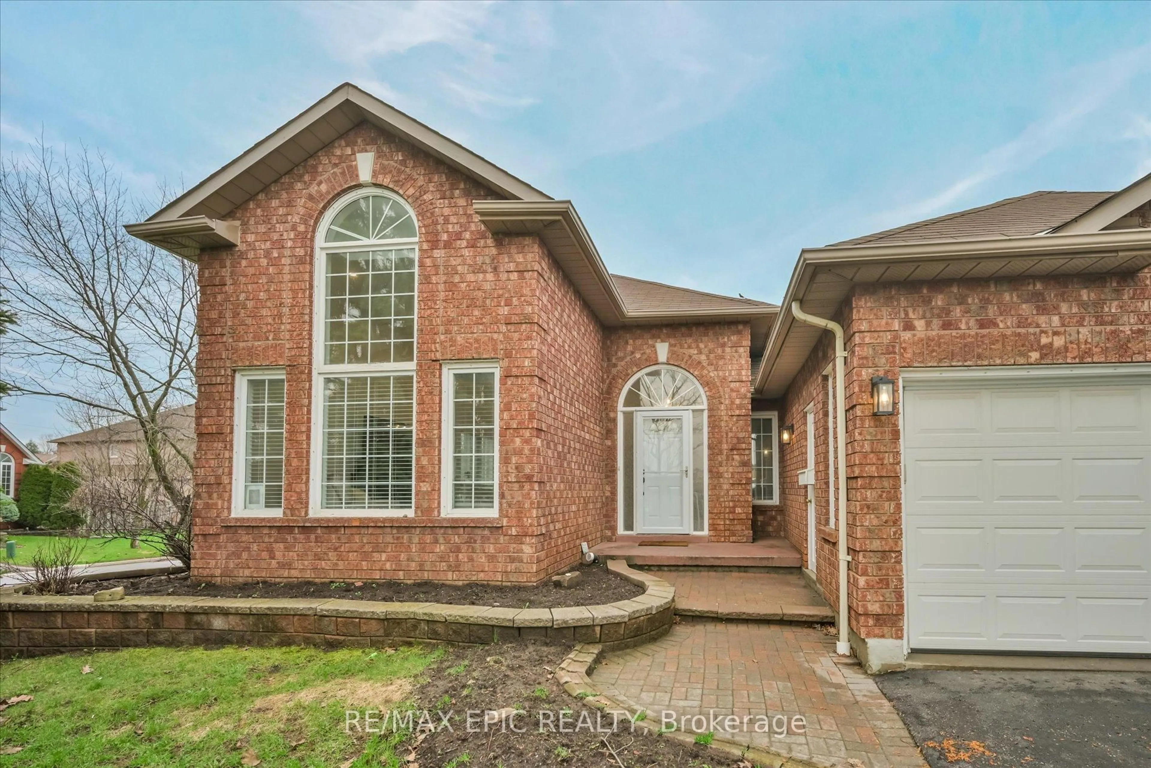 Home with brick exterior material, street for 33 Emmett Pl, Whitby Ontario L1R 2B4