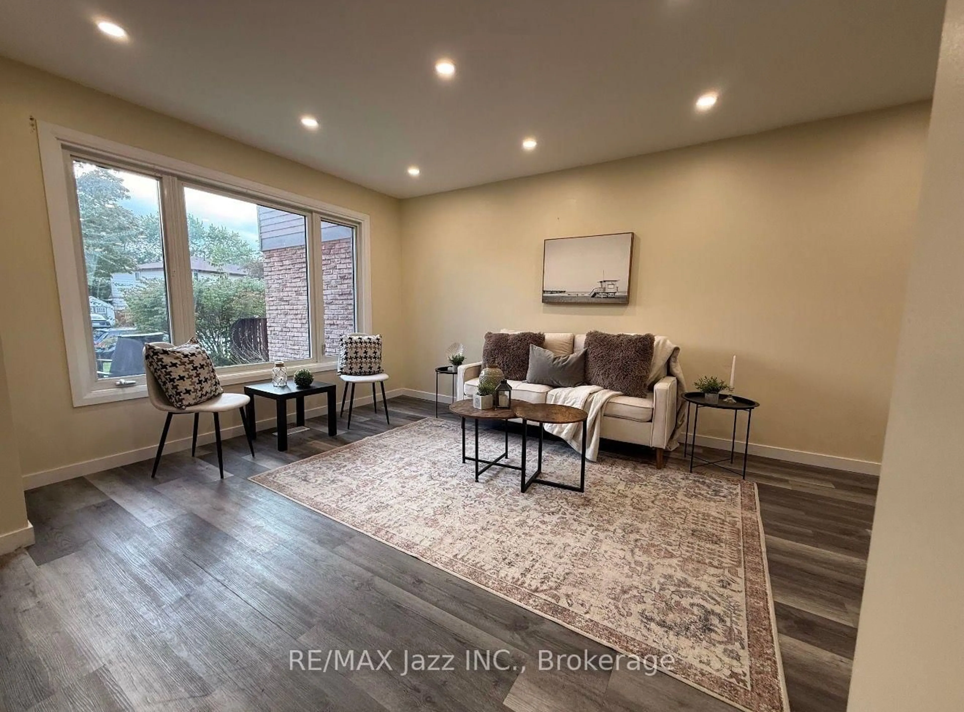 Living room with furniture, wood/laminate floor for 1293 Ludlow Crt, Oshawa Ontario L1G 7K5