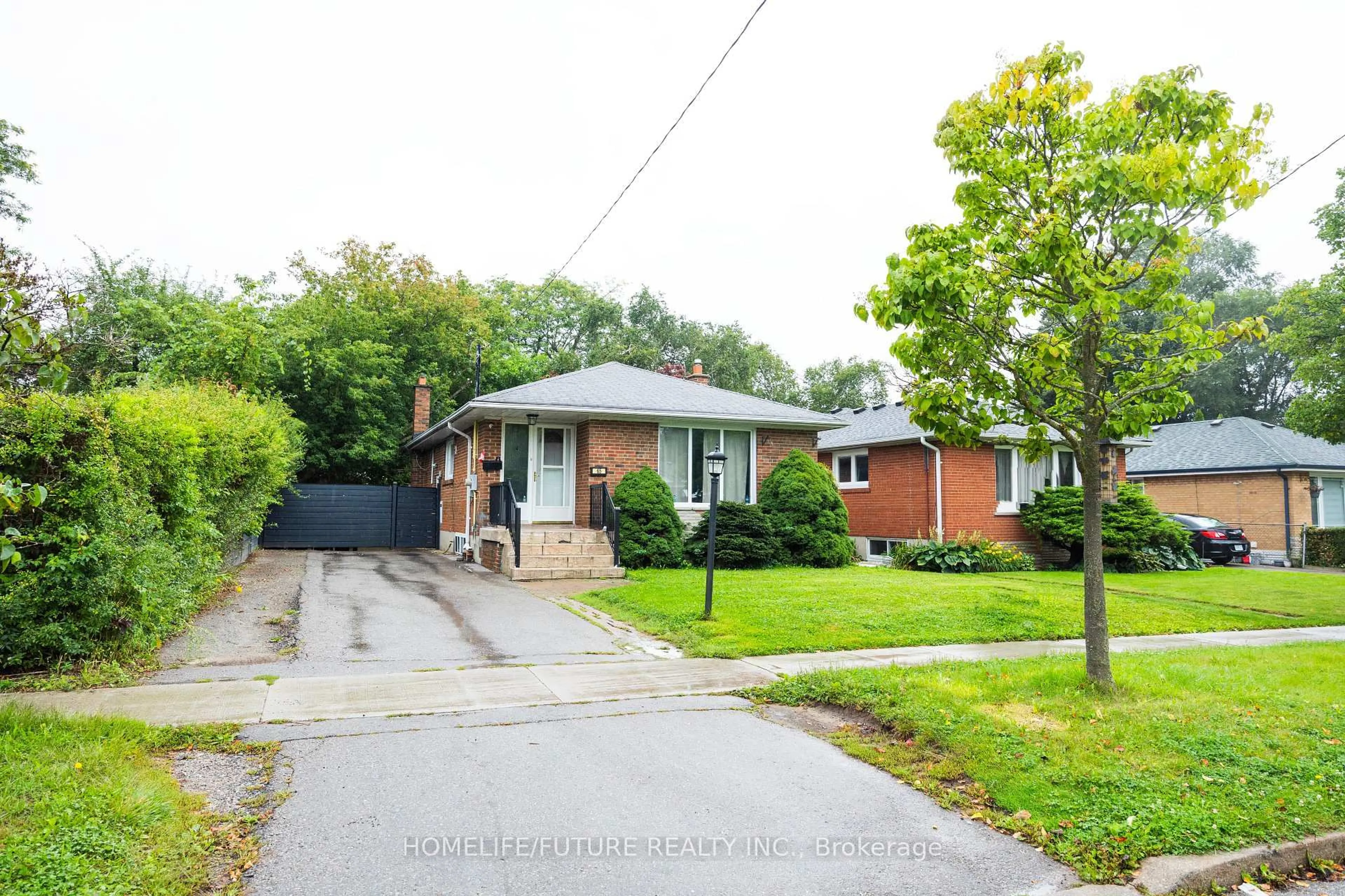 Home with brick exterior material, street for 65 Blakemanor Blvd, Toronto Ontario M1J 2W6