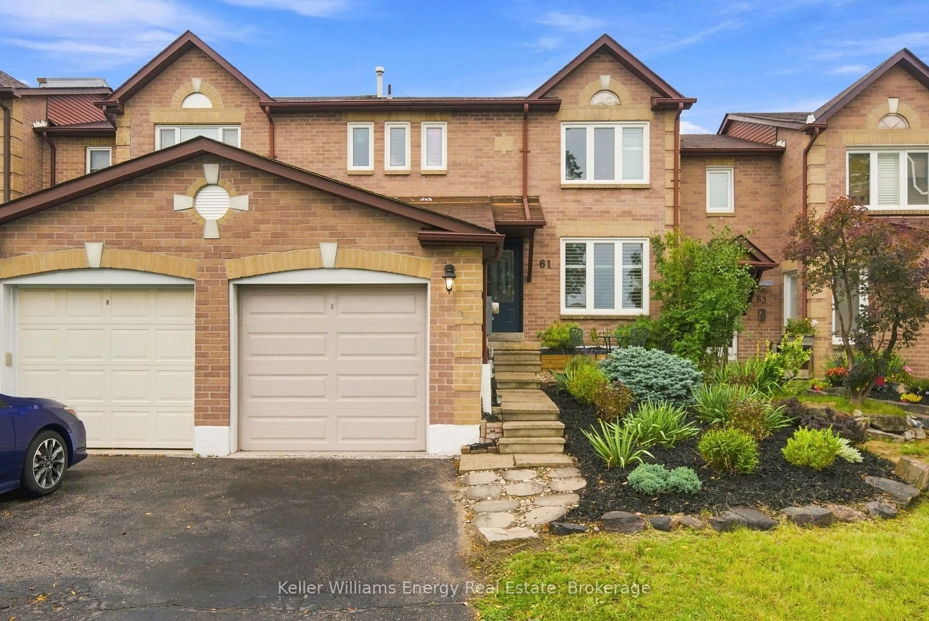 Home with brick exterior material, street for 61 Fernbank Pl, Whitby Ontario L1R 1T1