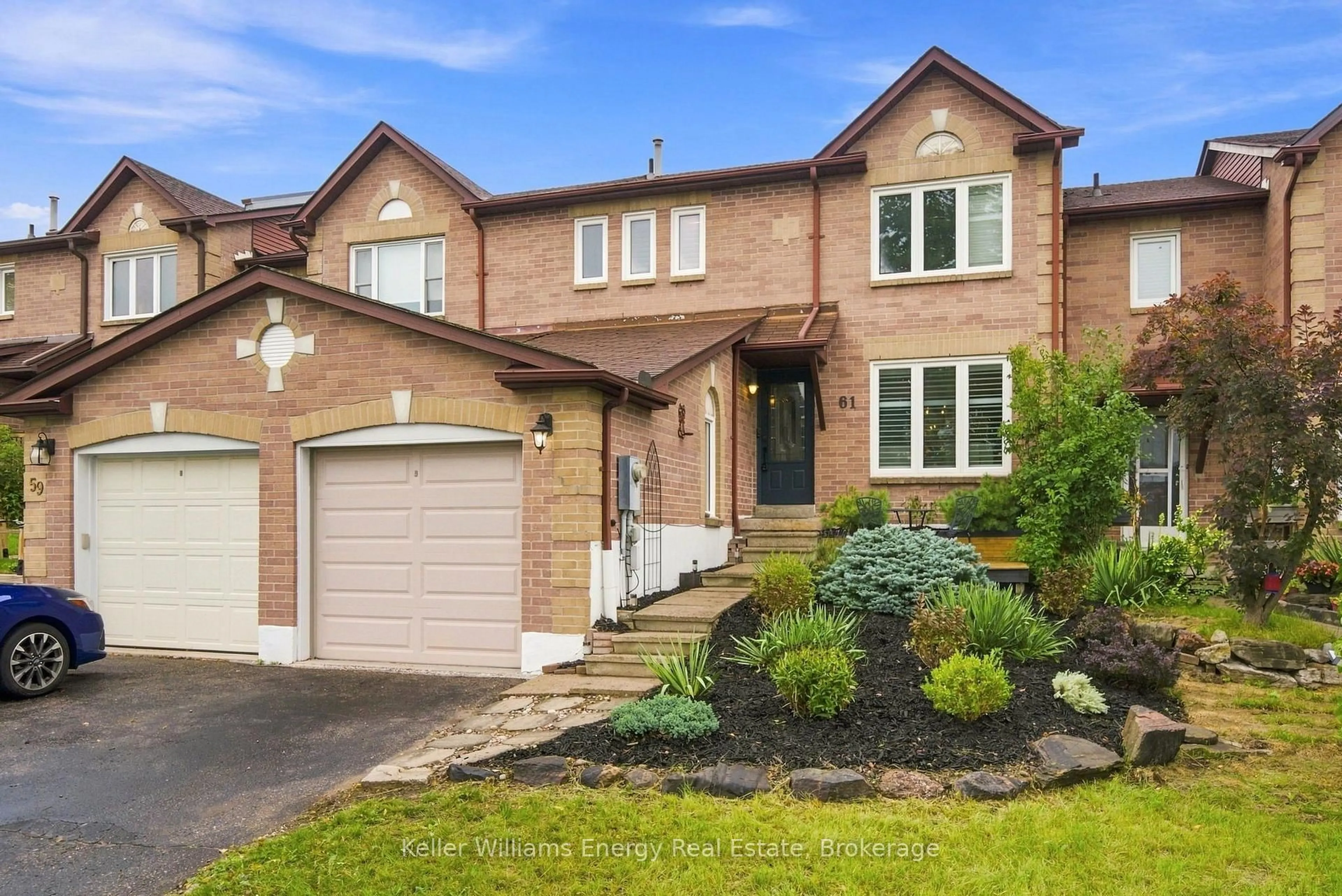 Home with brick exterior material, street for 61 Fernbank Pl, Whitby Ontario L1R 1T1